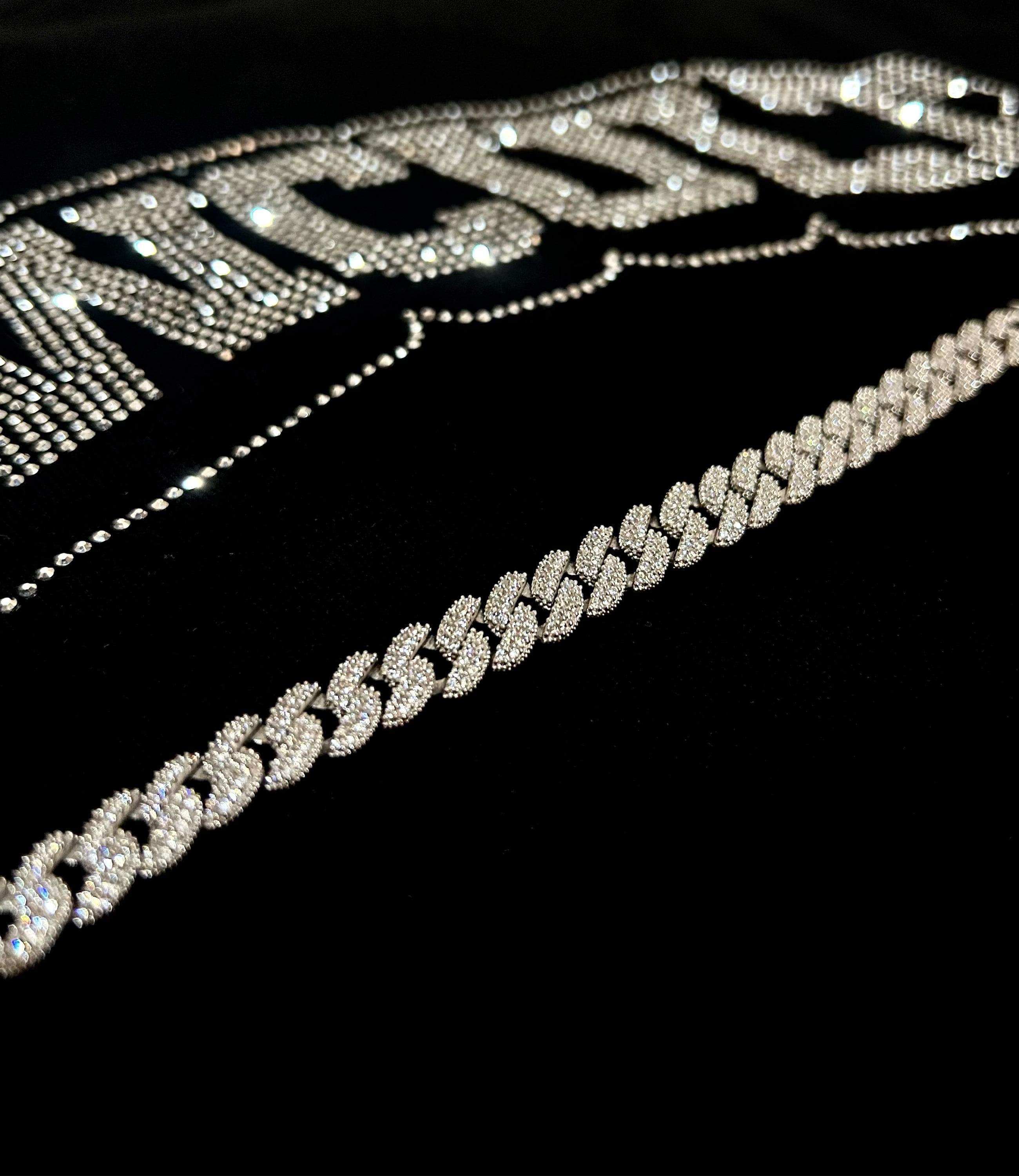 Crafted from 925 sterling silver and finished with rhodium plating, this iced Cuban bracelet offers timeless luxury and refined brilliance — a perfect gift for stylish men.