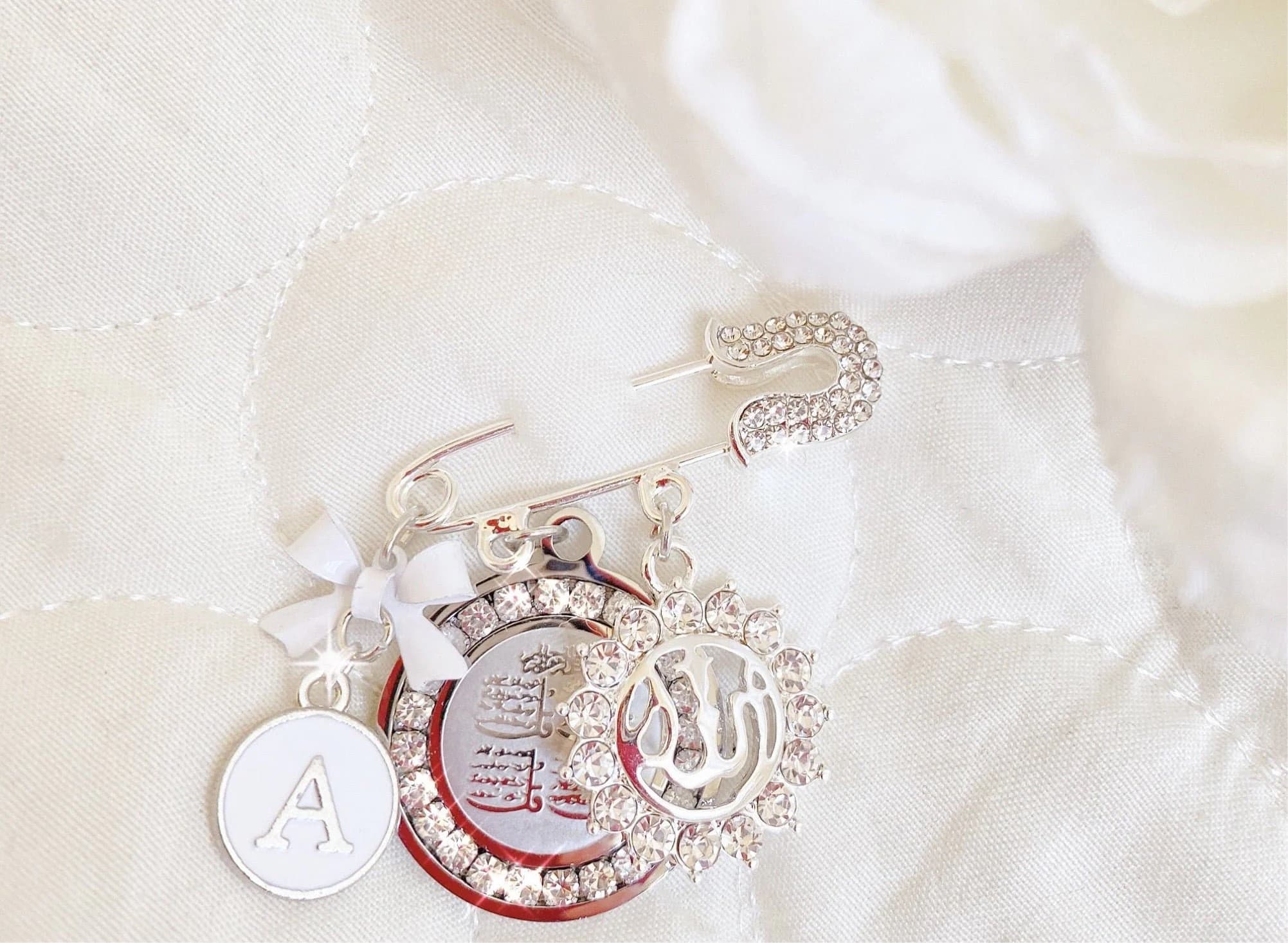 Small silver crystal tip pin in white with Ayat Kursi, and Allah