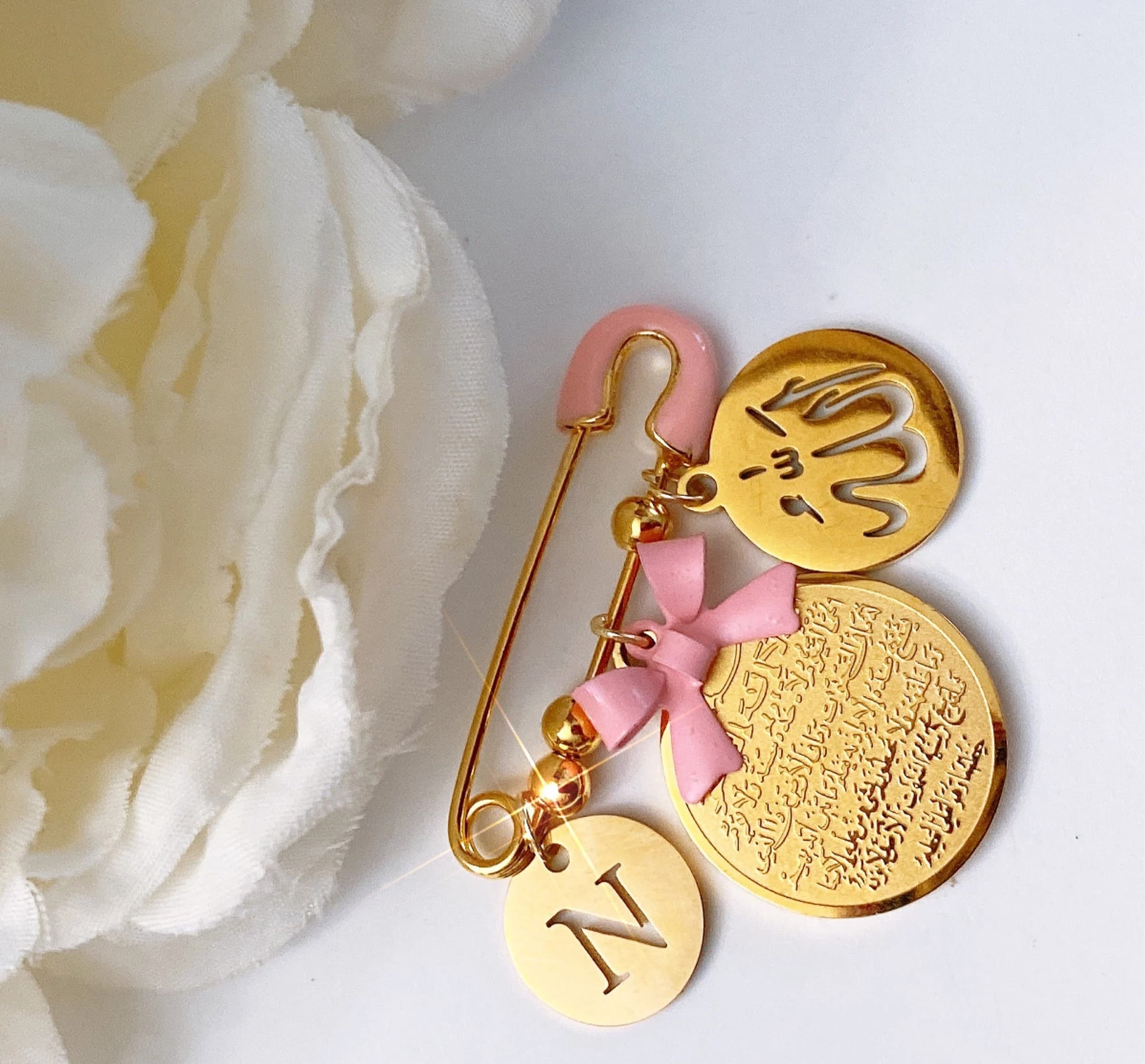 Small pink and gold bead pin with initial, Ayat Kursi, and Allah