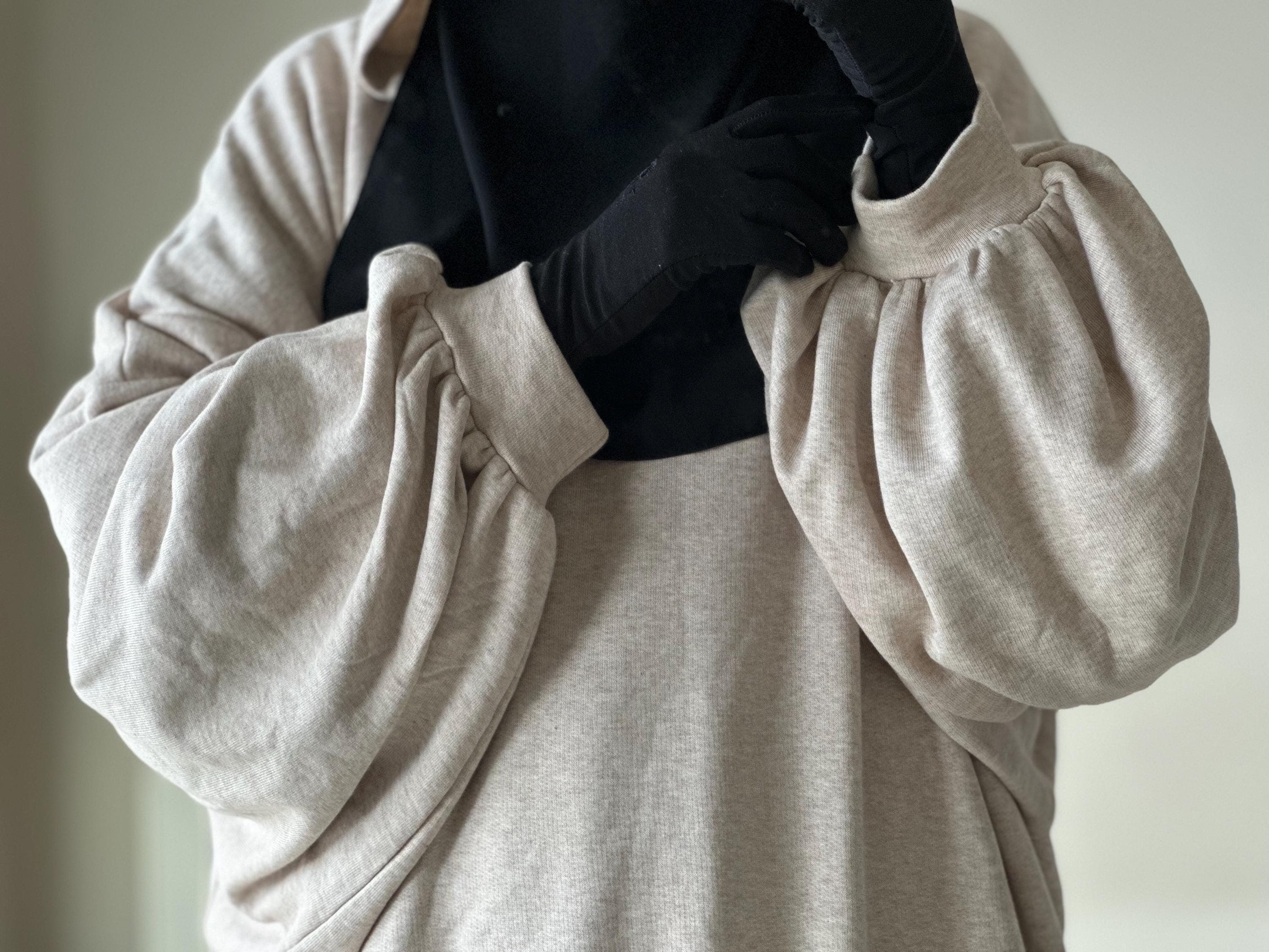 Modest Islamic hoodie featuring an extra wide and loose fit for ultimate comfort and style, perfect for modest fashion abaya coat