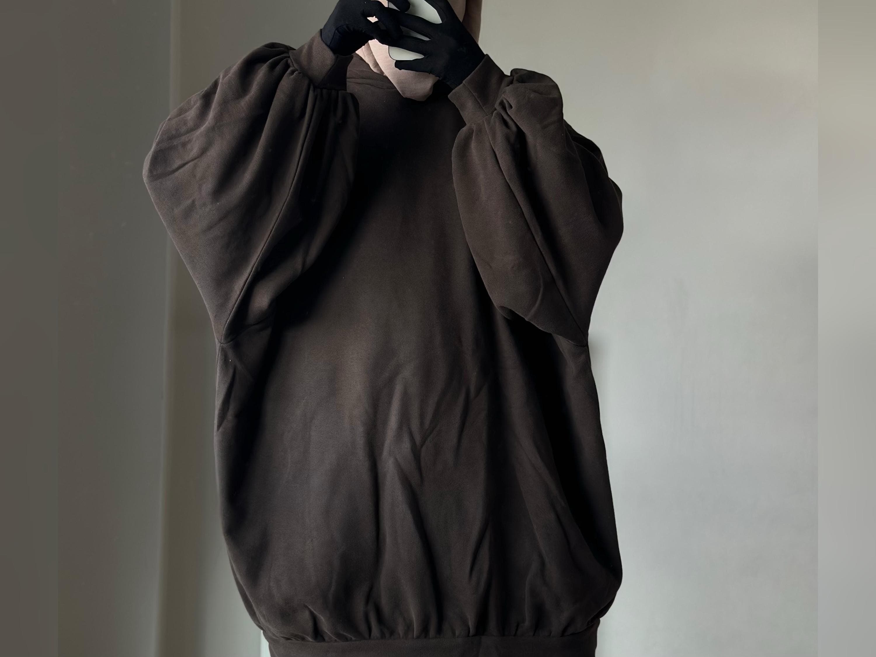 Modest Islamic hoodie featuring an extra wide and loose fit for ultimate comfort and style, perfect for modest fashion abaya coat