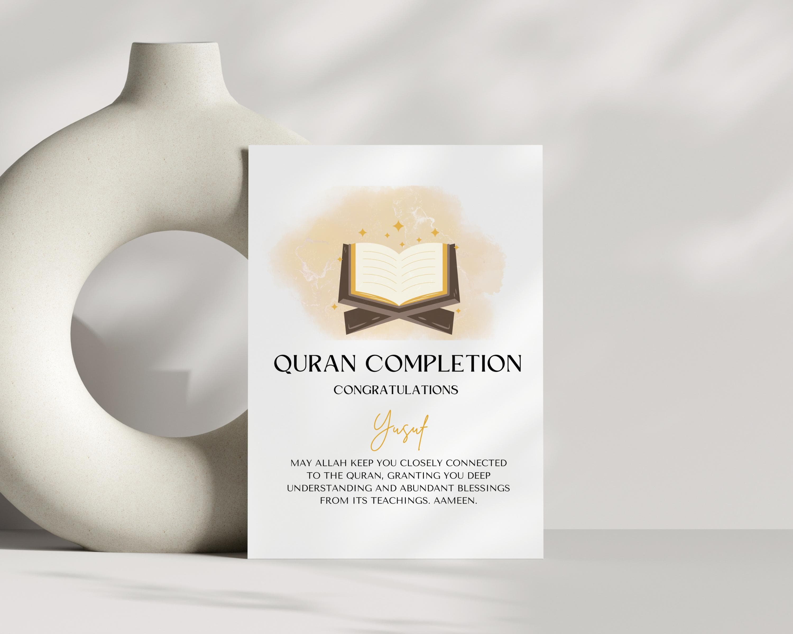 Celebrate the remarkable achievement of completing the Quran with this elegant Custom Quran Completion Card. This beautifully designed card is perfect for congratulating someone on their Khatam Al-Quran, marking a significant Islamic milestone.