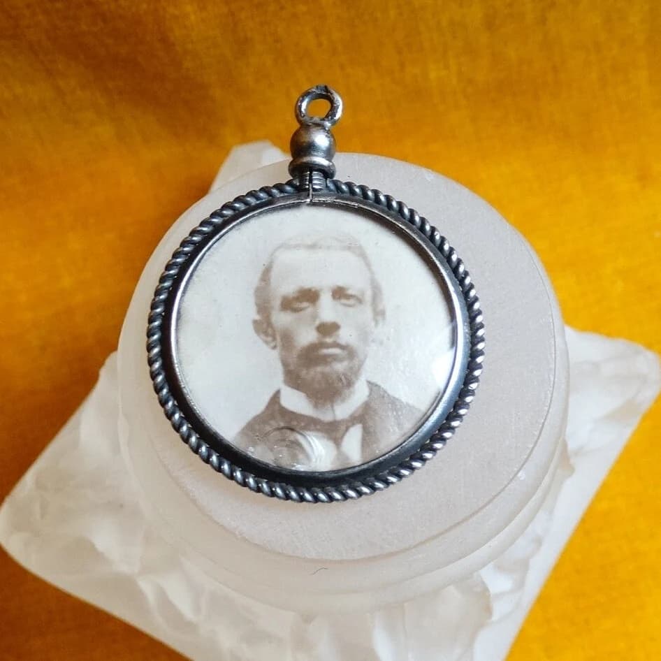 Antique Silver photo pendant. Round Memorial pendant with sepia tone photo of man