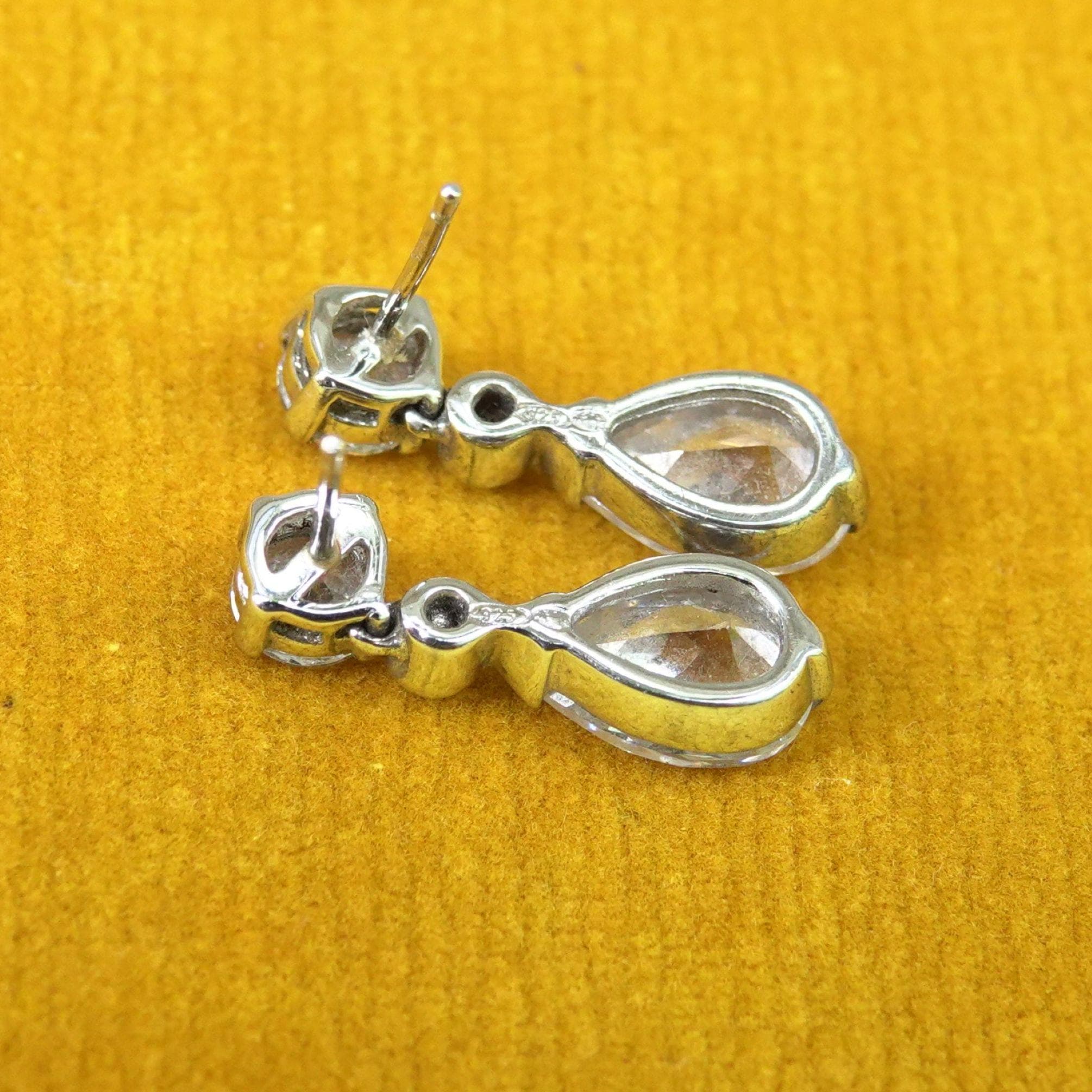 View of back of pear drop crystal & 925 earrings