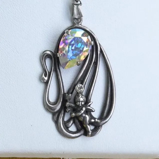 Art nouveau style Cupid charm on chain