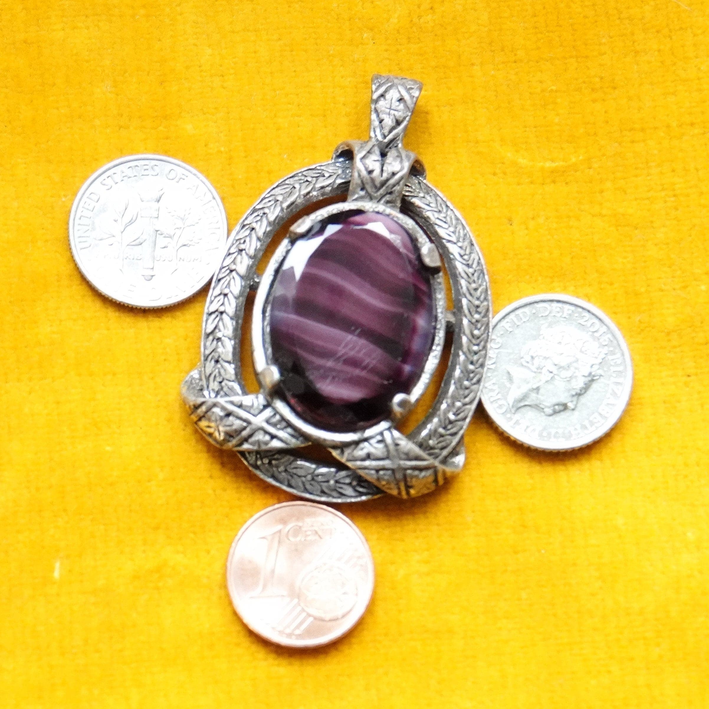 Miracle pendant amethyst look charm with coins for scale
