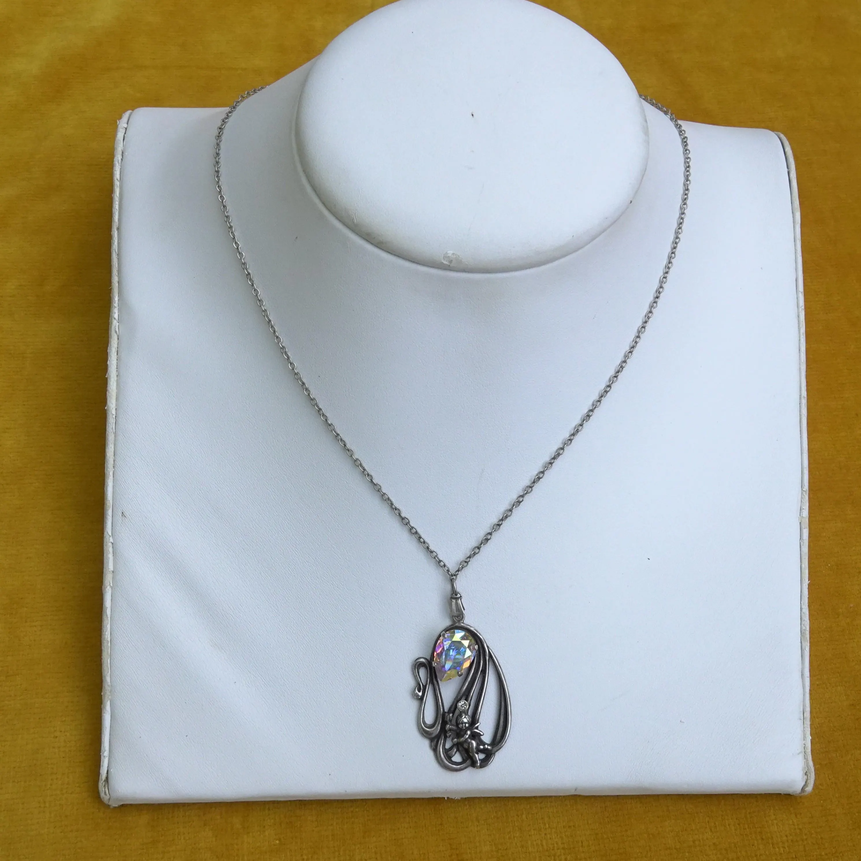 Vintage Cherub necklace with aurora borealis rhinestone