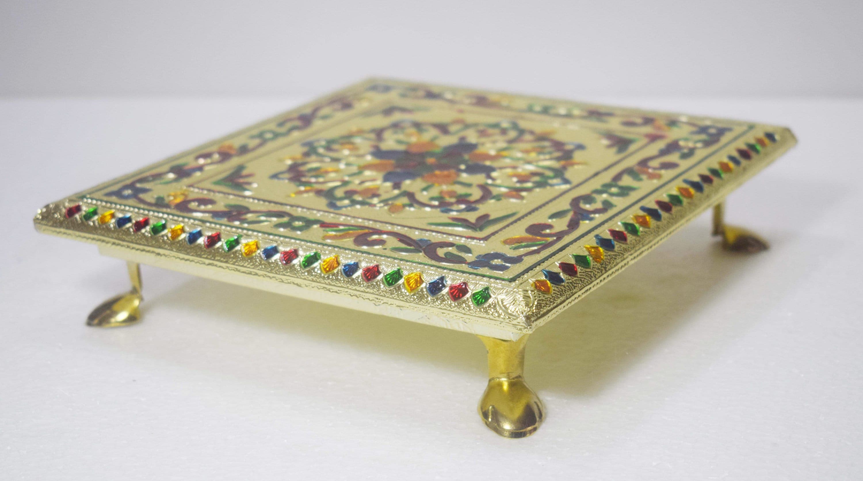 wooden meenakari pooja chowki,
traditional pooja chowki,
handcrafted pooja chowki,
Hindu religious ceremonies,
wooden prayer stand,
carved pooja chowki,
hand-painted pooja chowki,
mandir decoration,
religious home decor,
wooden meenakari chowki