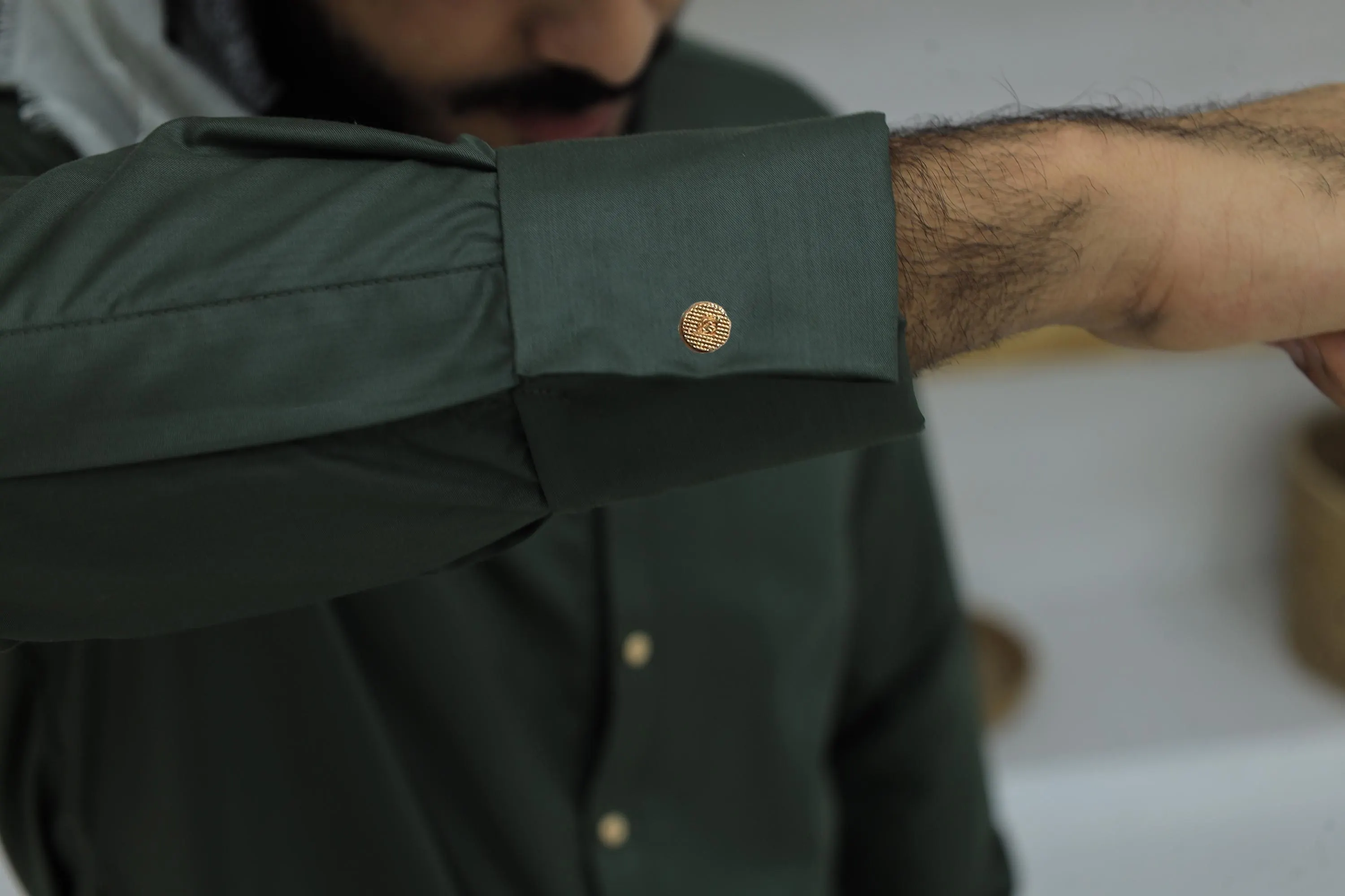 Midnight green collar thobe with gold buttons
