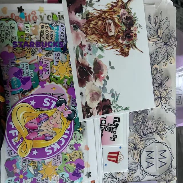 a bunch of stickers that are on a wall