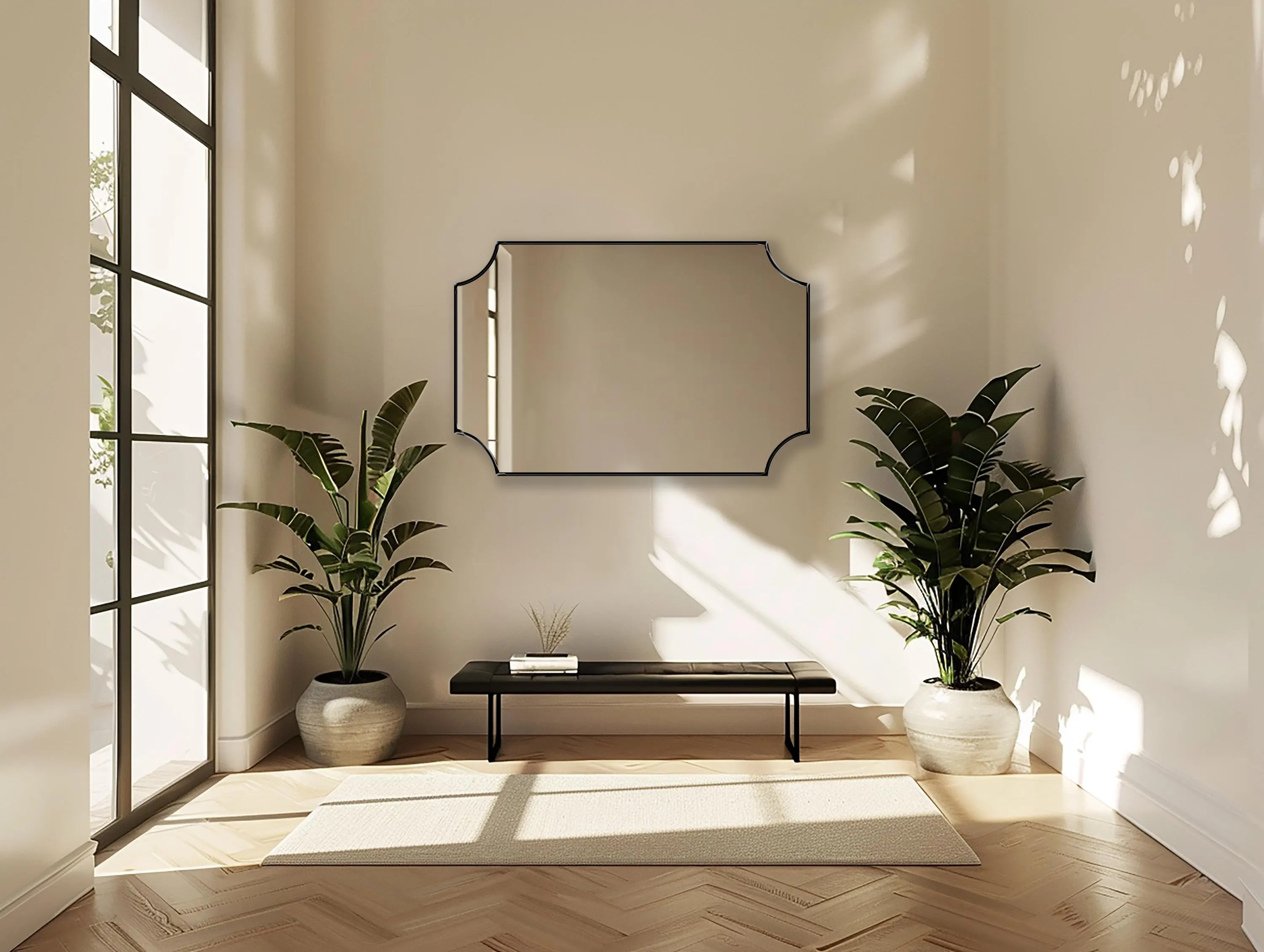 Scalloped Rectangle Mirror with black frame hung on the wall of an entryway over a bench.