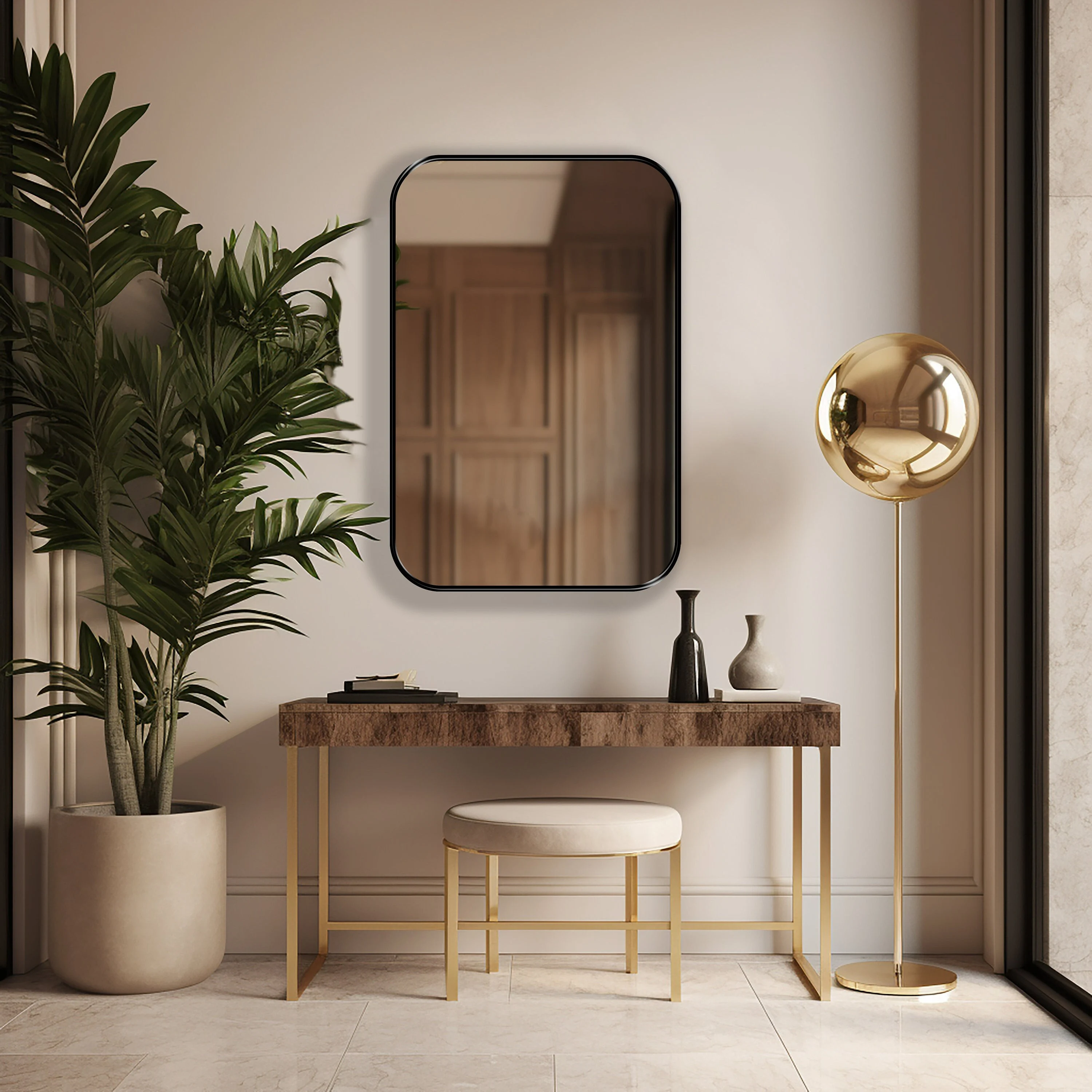 Rectangle mirror with black frame hung on the wall of an entryway.
