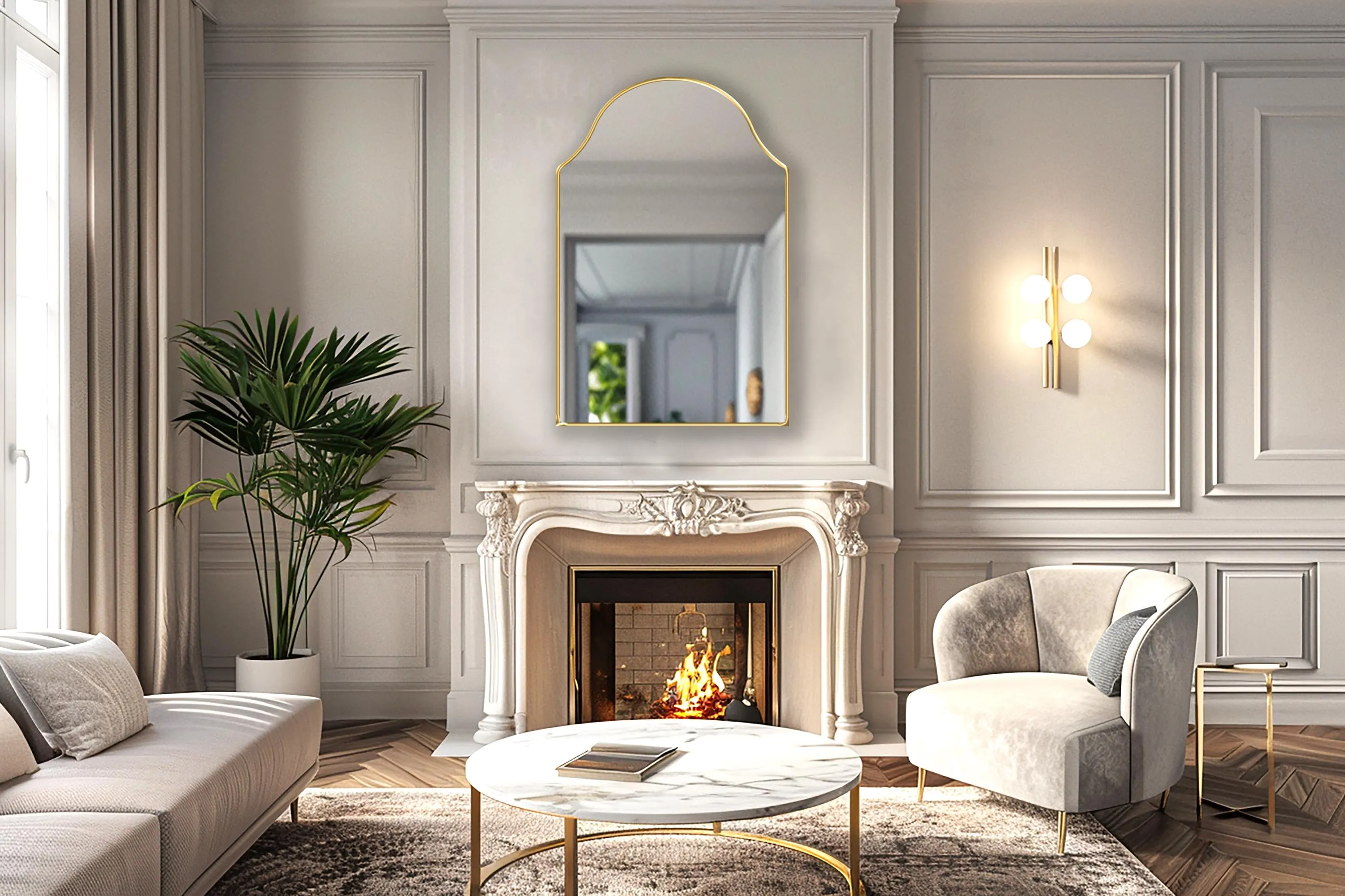 Andalusia Mirror with gold frame hung on the wall of a living room over a fireplace.