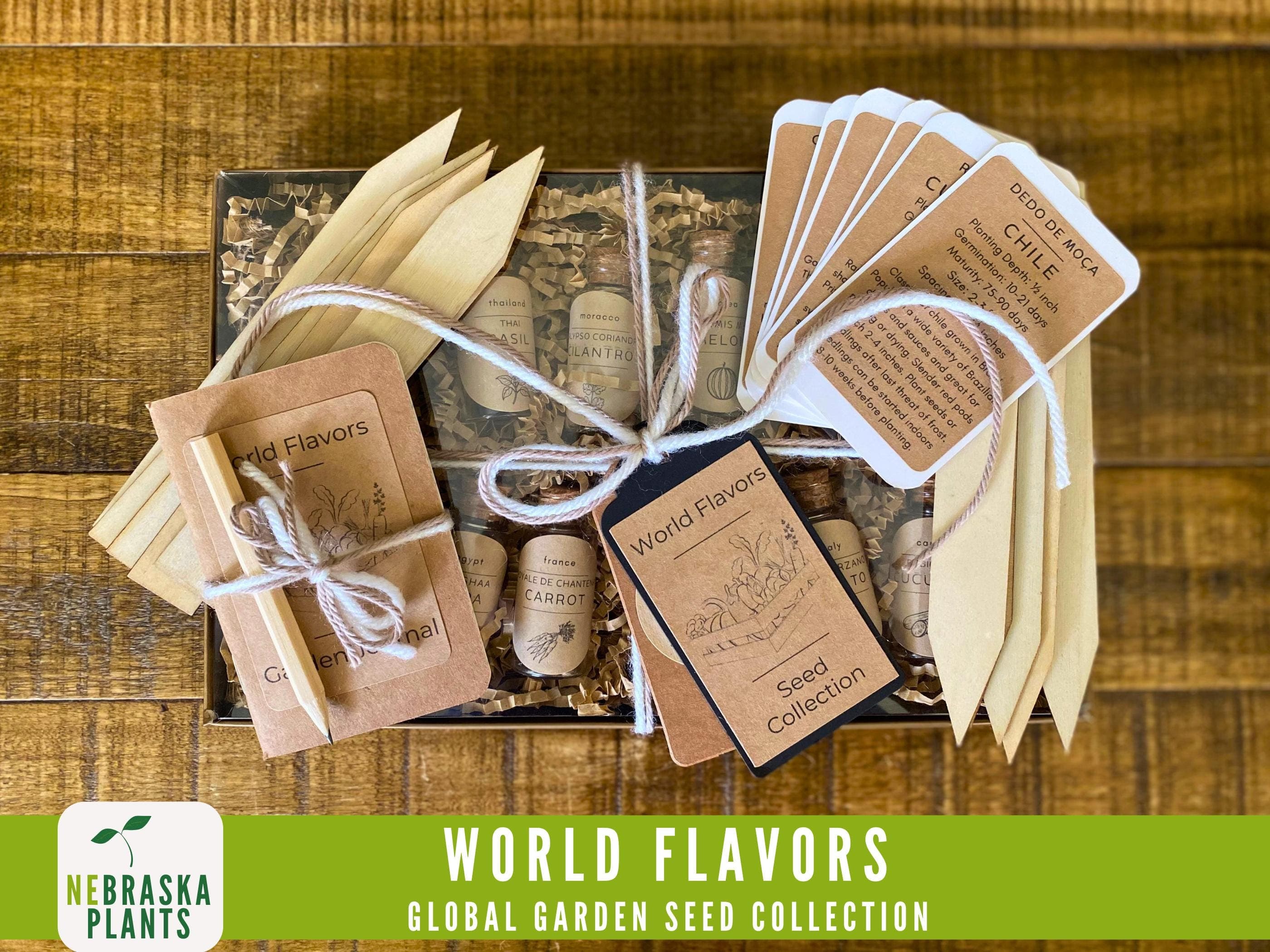 Assorted global herb and vegetable seeds including Thai basil, San Marzano tomato, and Moroccan cilantro