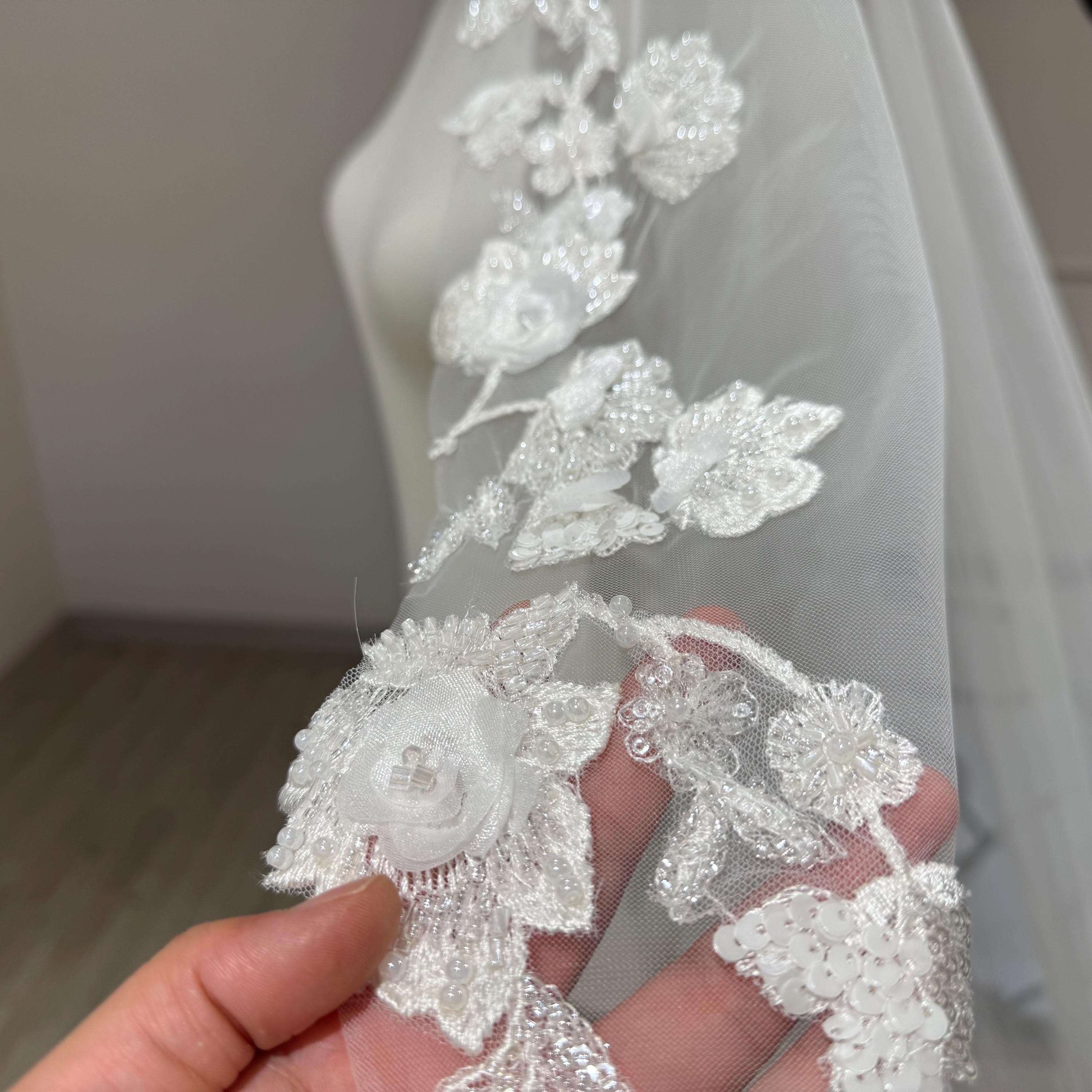 The flower veil integrates with the wedding dress and the bridal veil - image 4