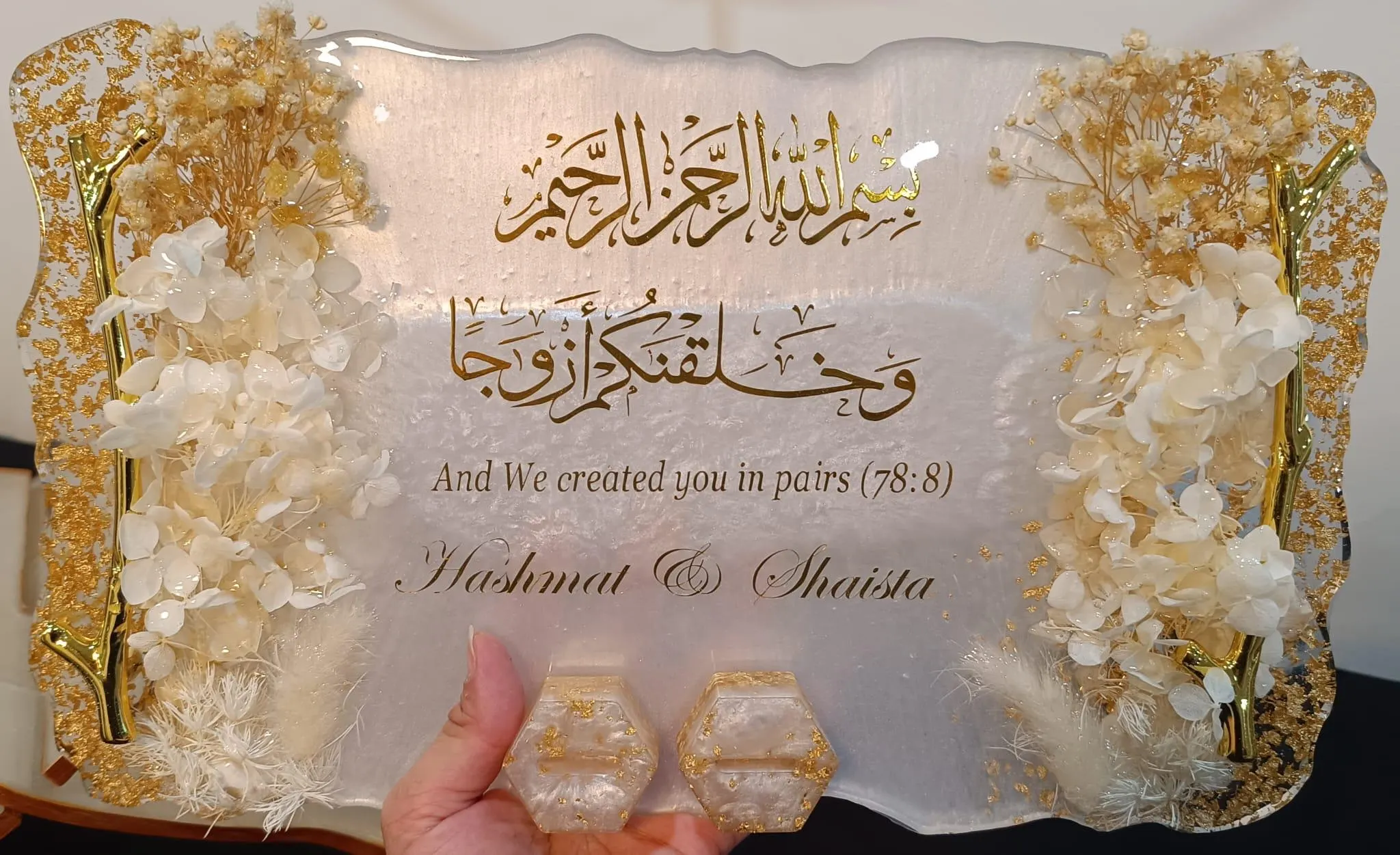 white and gold tray with tree branch handle