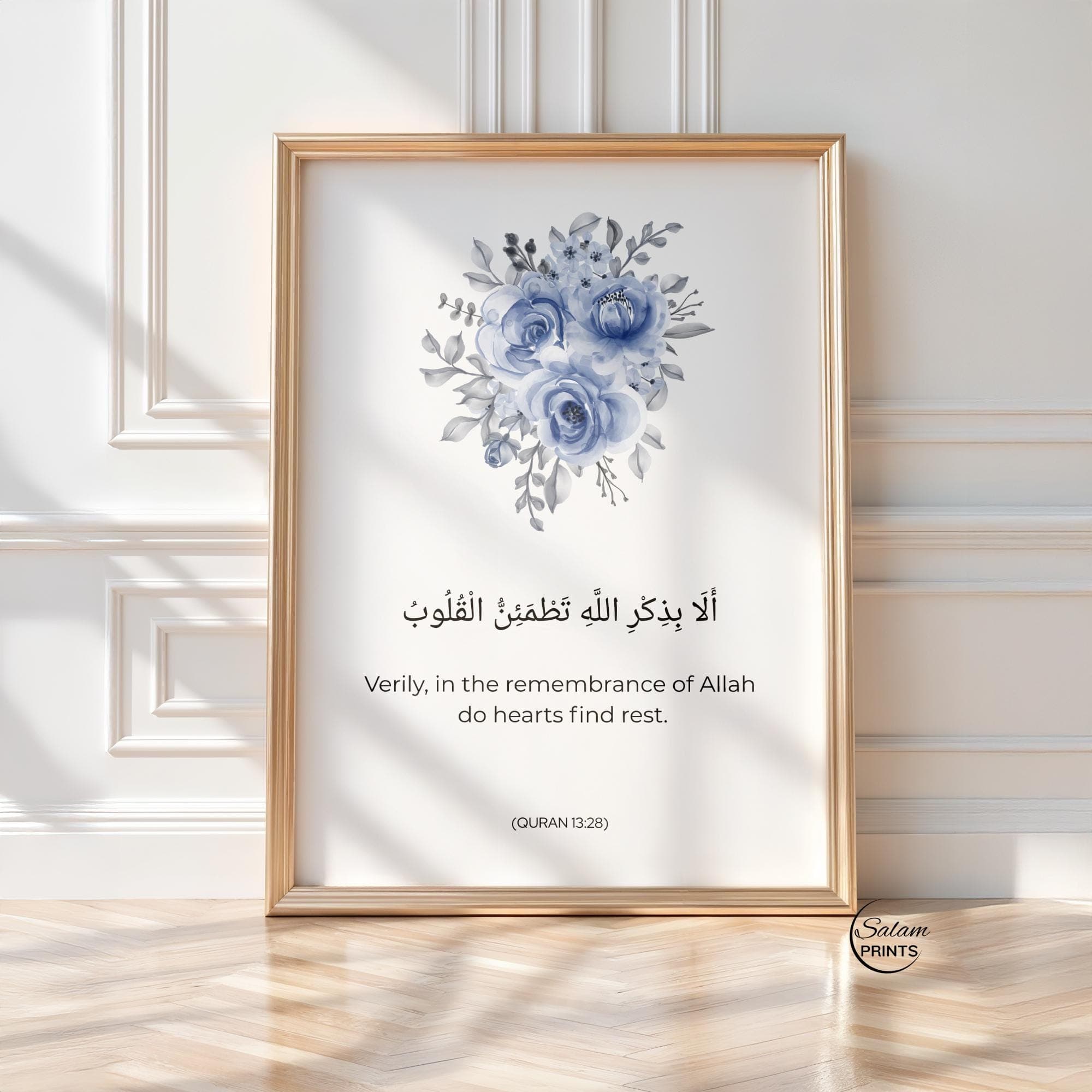 QURAN QUOTE ART ,  Minimalist WATERCOLOR FLOWERs IN blue  on white background  , BELOW IT IS WRITTEN QURAN VERSE - '' Verily in the remembrance of Allah do heart find rest.'' IN ARABIC CALLIGRAPHY AND ENGLISH TRANSLATION.