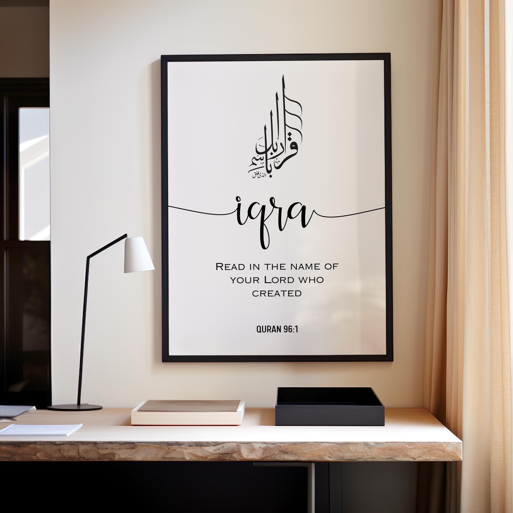 Minimalist Arabic calligraphy featuring the Quranic verse IQRA ;Read in the name of your Lord who created(Quran 96:1) in an elegant black-and-white design. Below it is written the full verse translation in engl;ish in capital easy to read letters this  modern elegant fonts decor adds a modern touch, making it perfect for a study, prayer room, or living space. This Islamic digital download is ideal for Muslim home decor, Quran-inspired art, and unique Islamic gifts, bringing faith into any space.