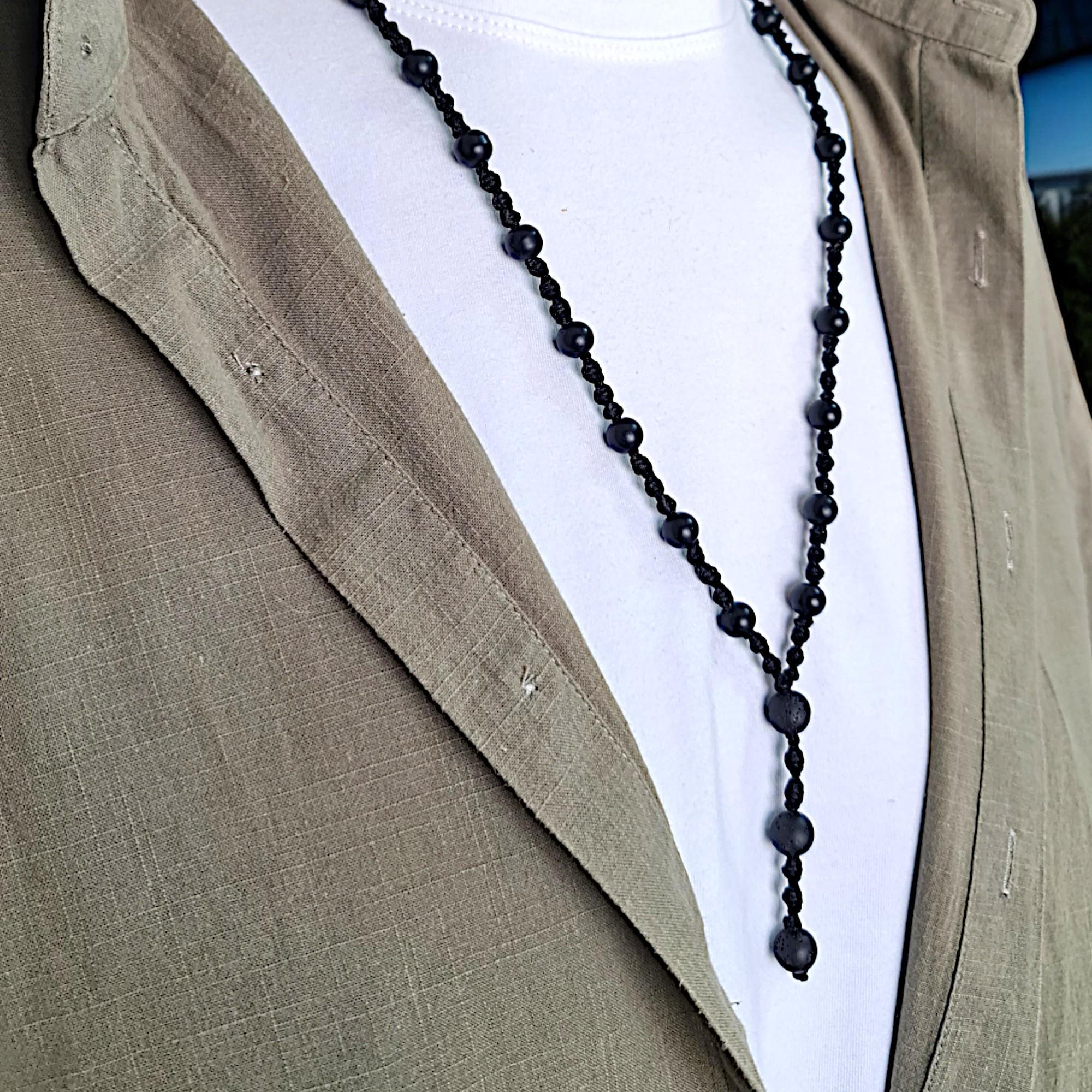 Macrame-knotted mens necklace with black onyx and lava stone beads for grounding and calm
