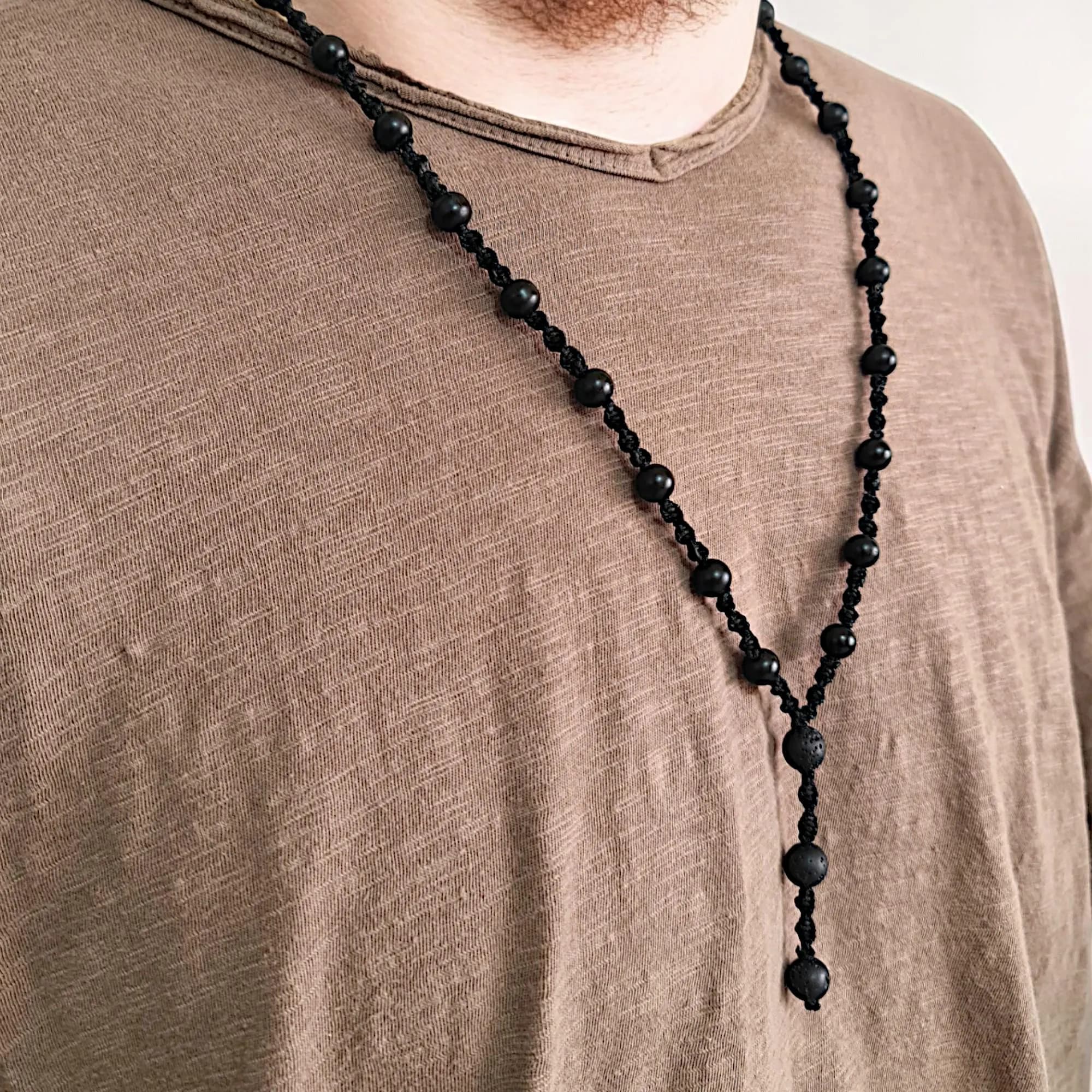 Spiritual jewelry for men featuring lava stones and black onyx in a bold minimalist design