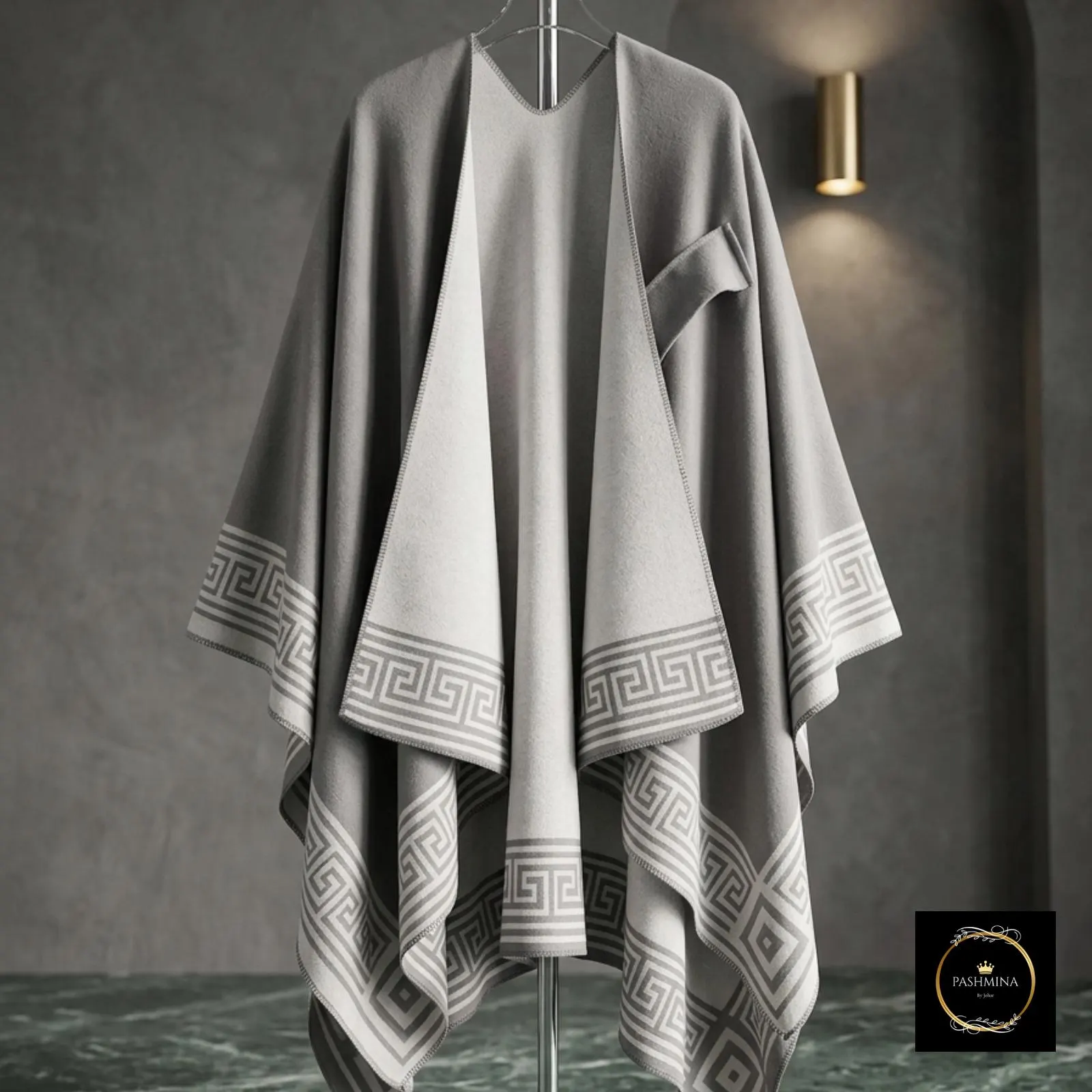 Unisex poncho wrap layered over casual autumn clothing.