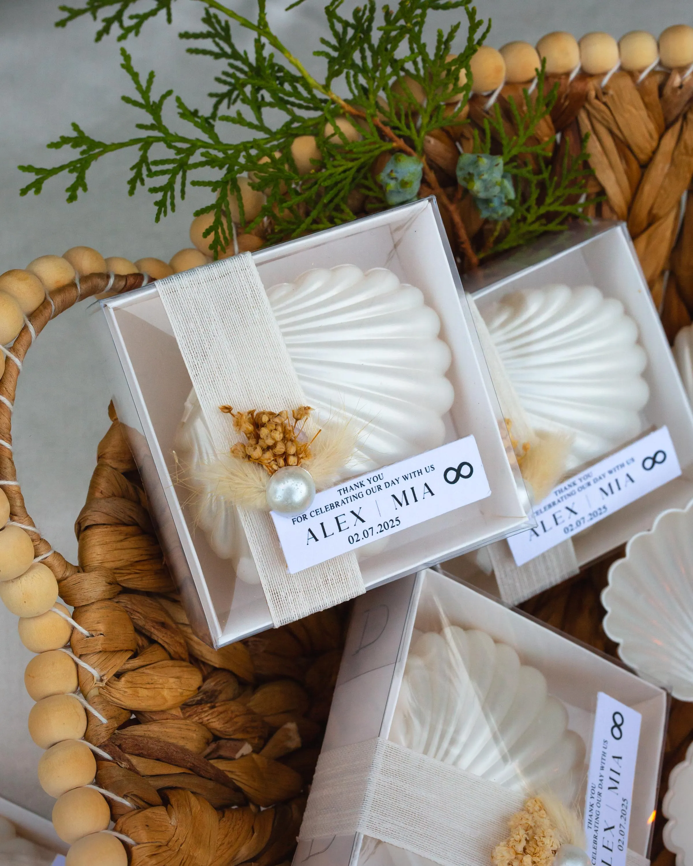 Custom oyster candle favor with ribbon and tag, coastal wedding guest gift boxed for summer weddings or seaside events.