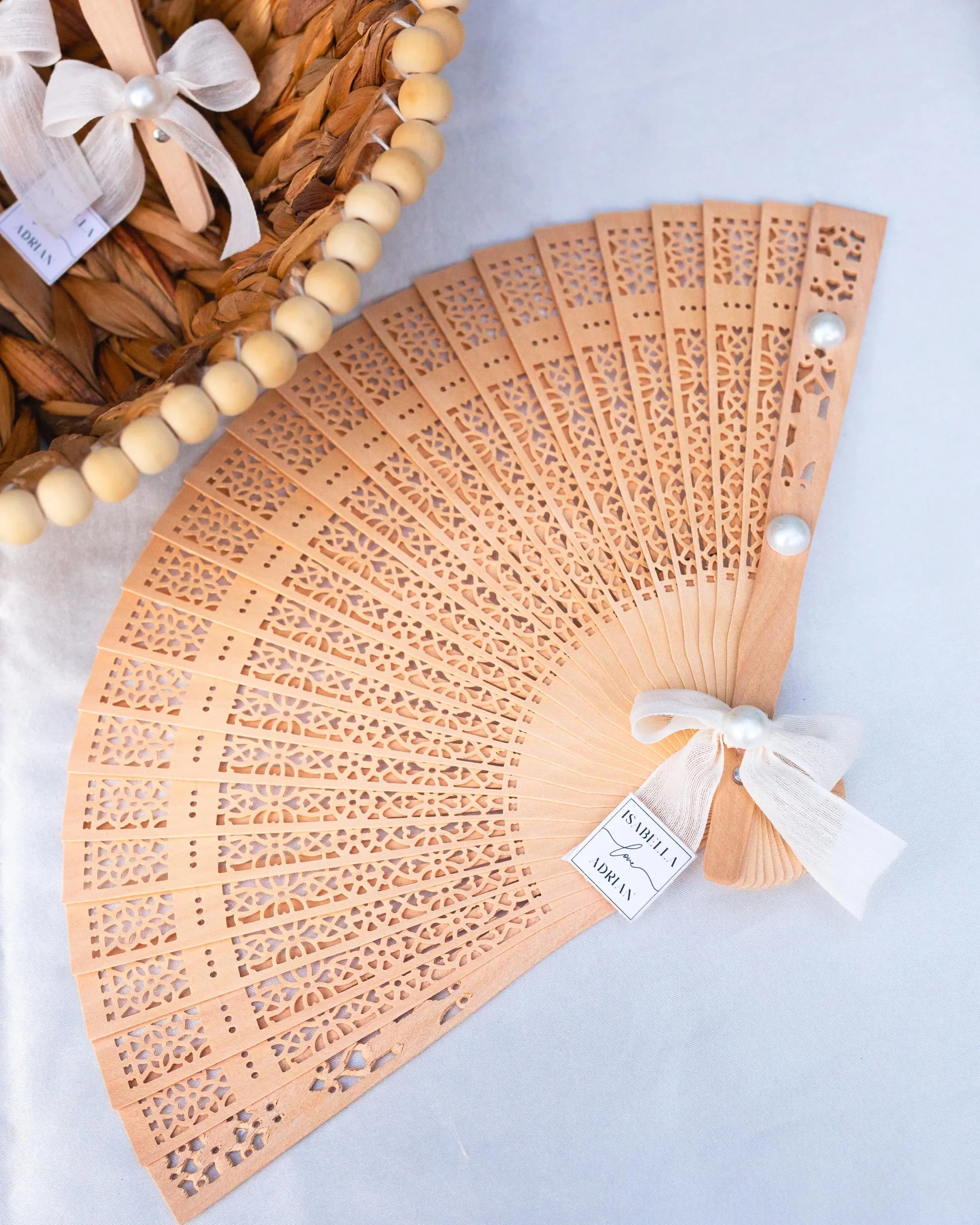 Bulk wooden hand fans with pearl accents for weddings