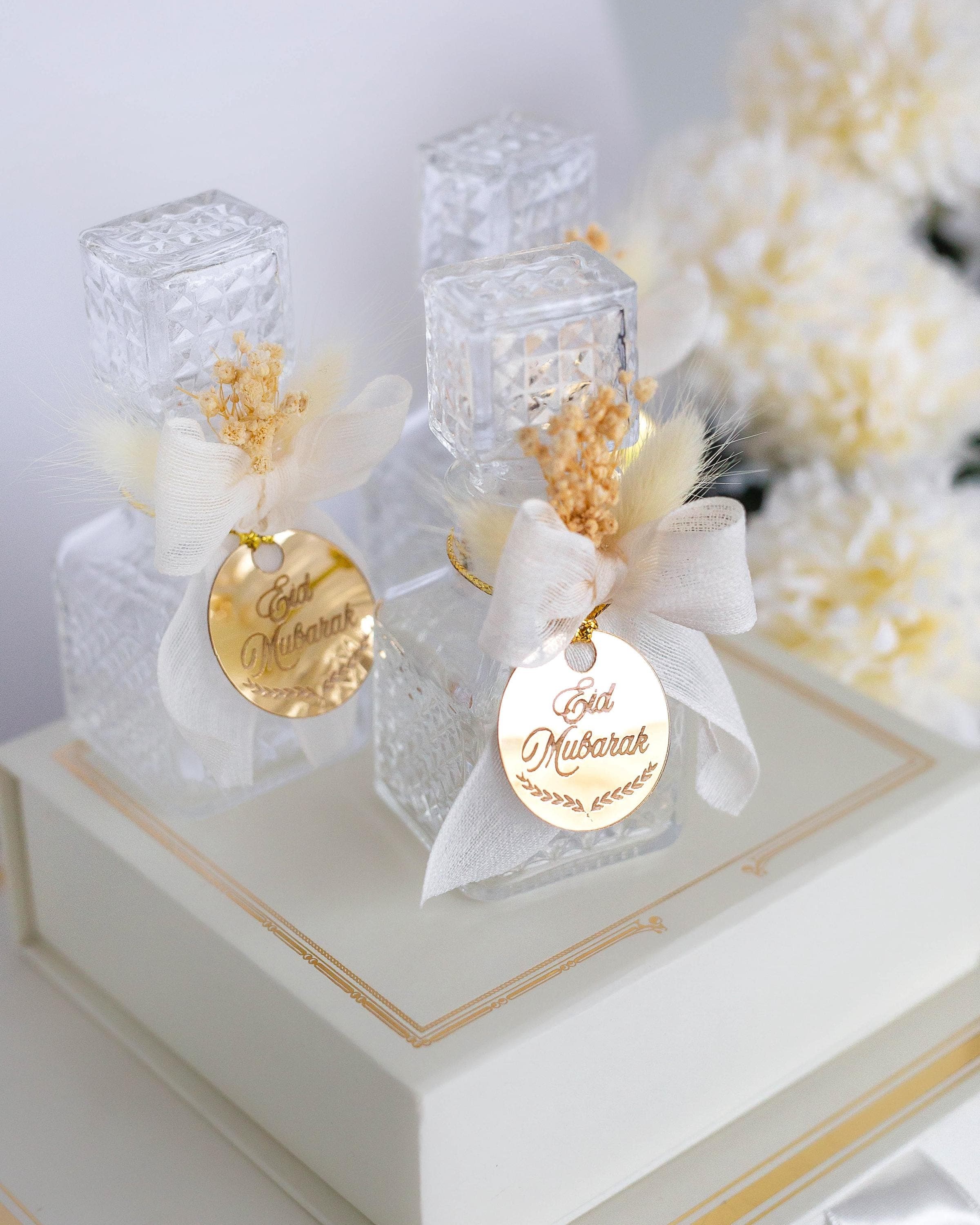 Handmade zamzam bottle favors islamic party favors with ribbon floral detail gold acrylic tag personalized name date muslim event gift