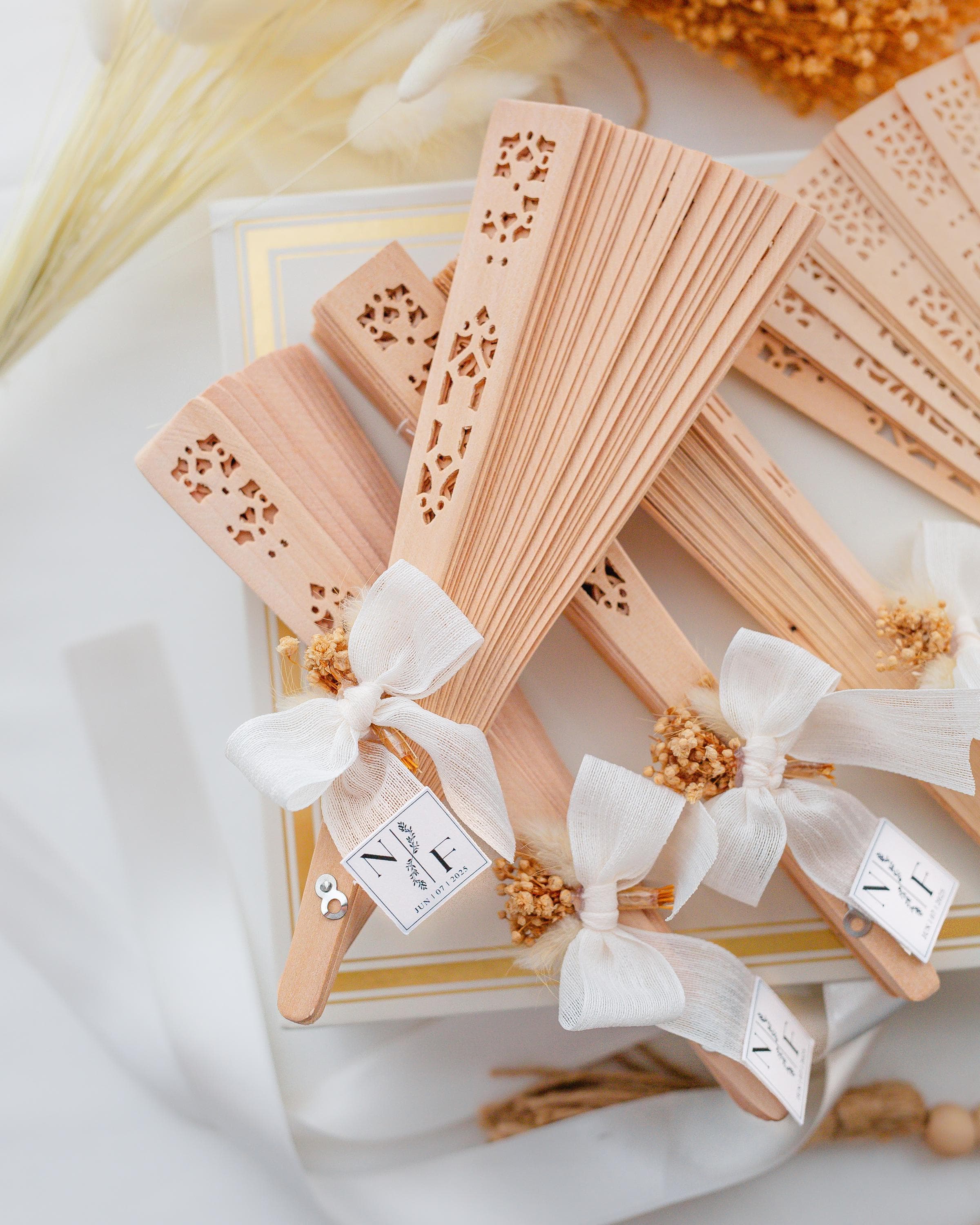 Summer wedding sandalwood fan with ribbon and flower