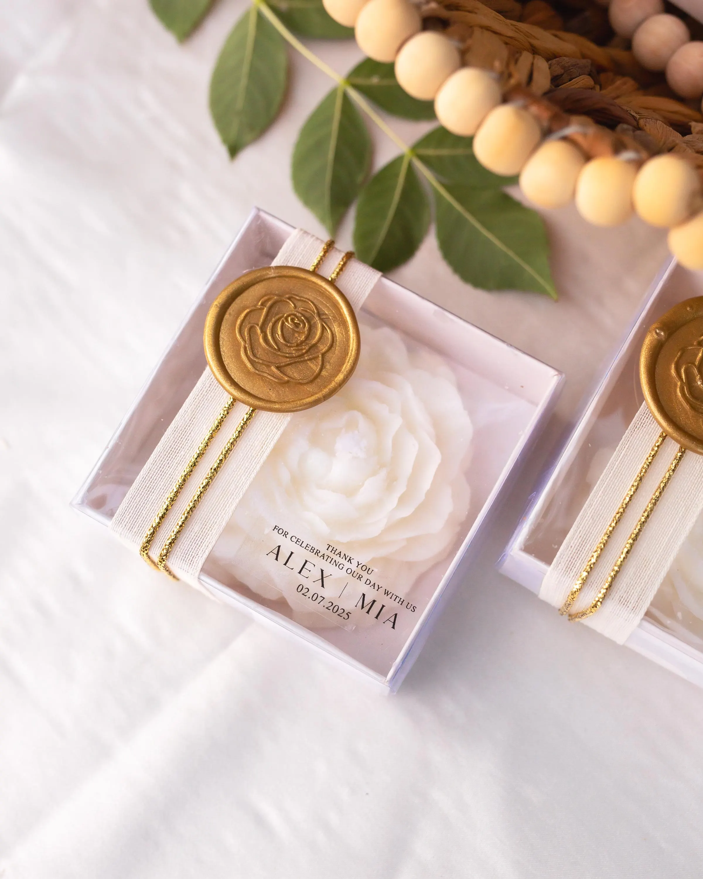 Handmade peony candle with delicate flower detail and custom message option