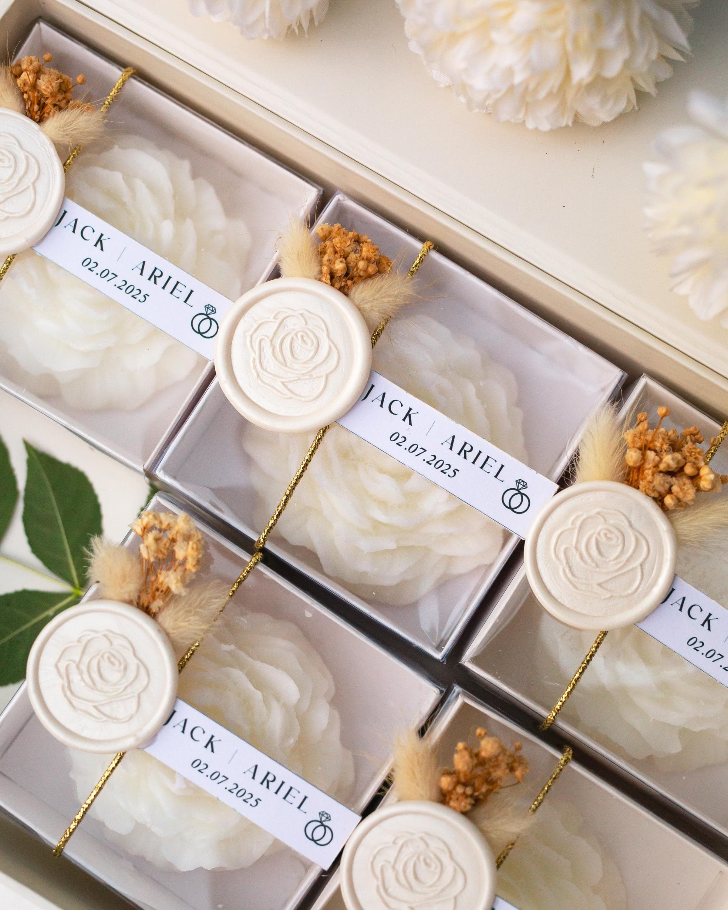 Personalized peony candle favor with custom label for wedding guests