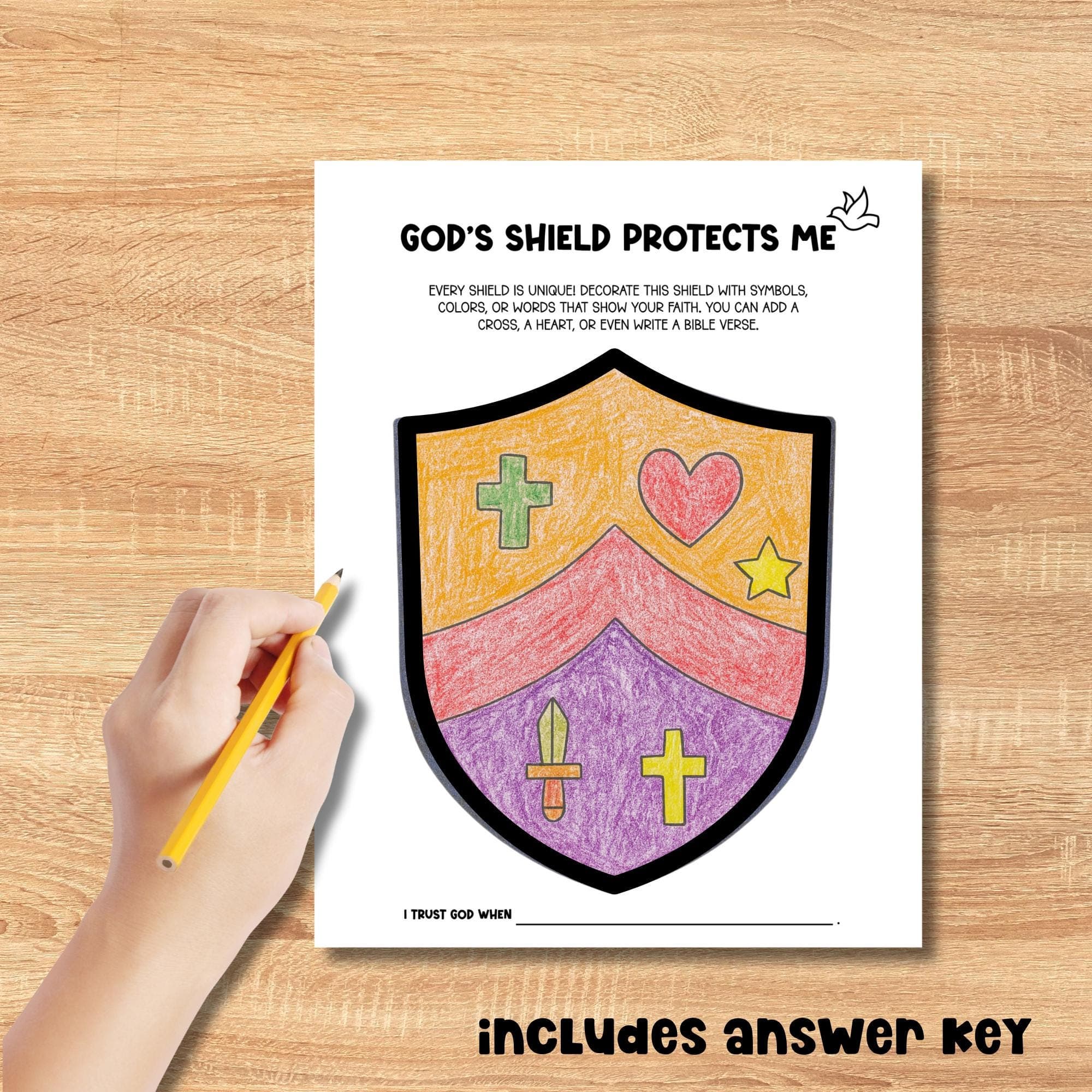 Printable Armor of God shield activity for kids featuring a blank shield to decorate with Christian symbols and a finished example. Great Sunday school Bible lesson craft about faith and God’s protection.