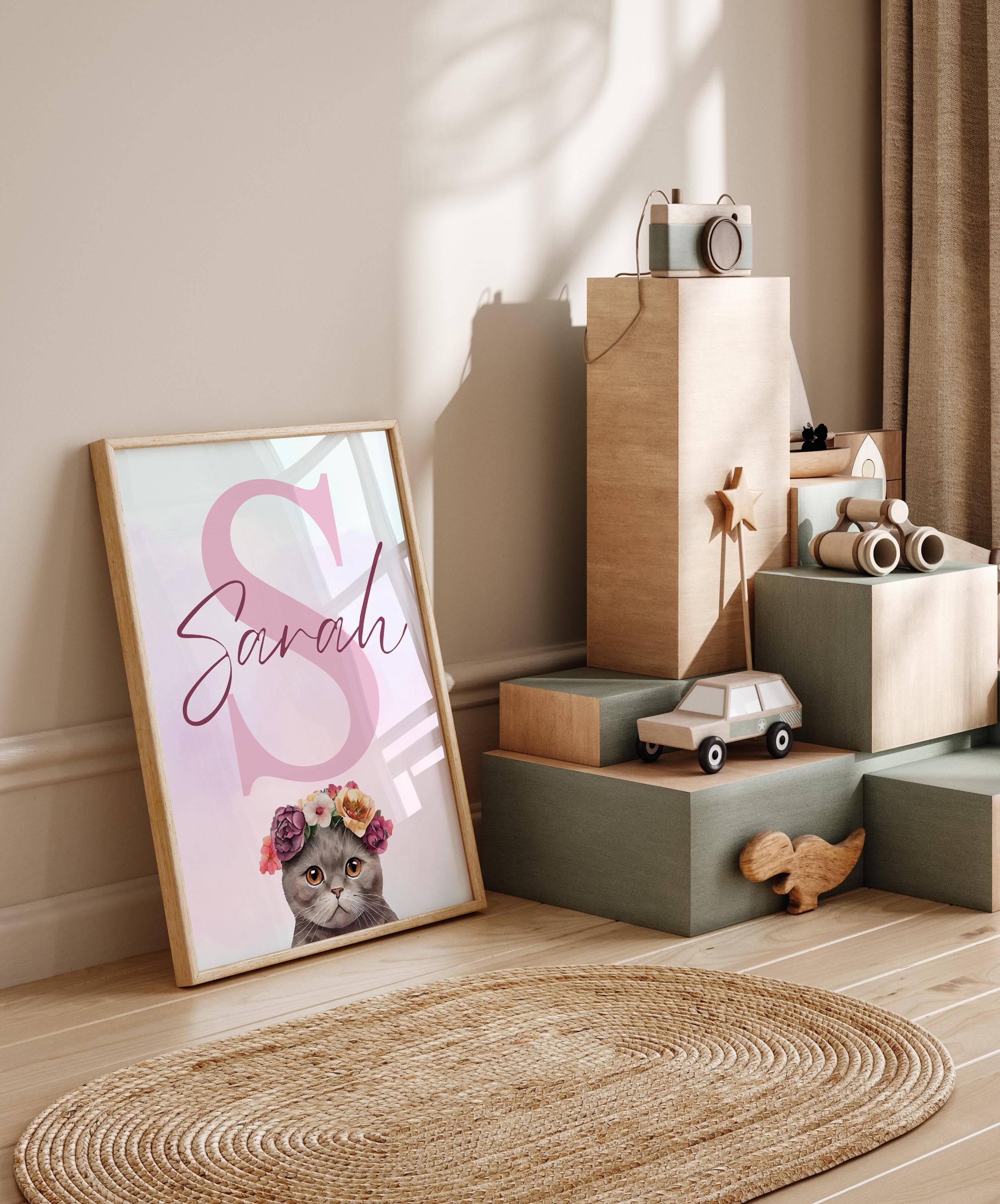 Soft pink watercolor cat and floral wall decor for nurseries.