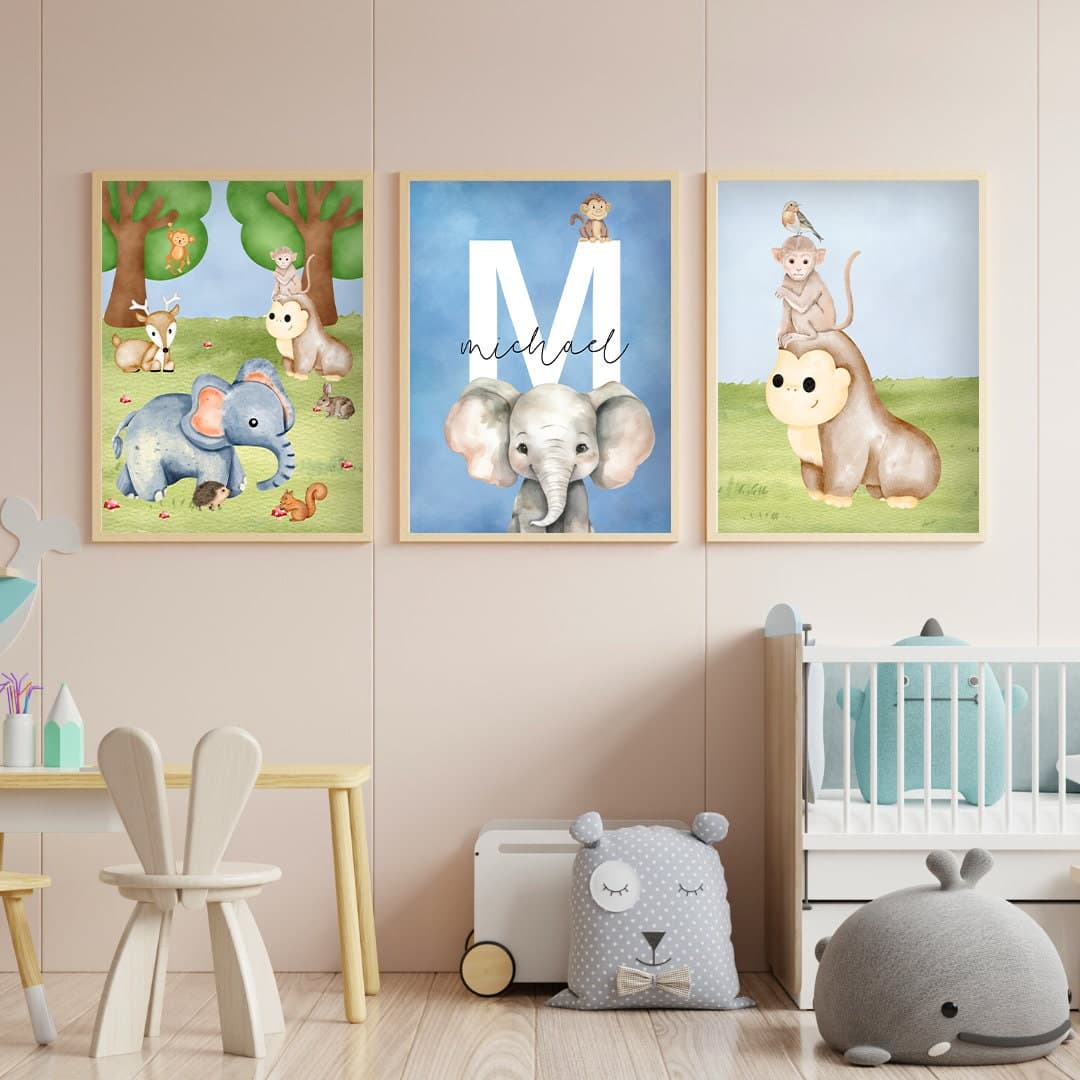 Jungle-themed nursery decor with elephant and giraffe illustrations