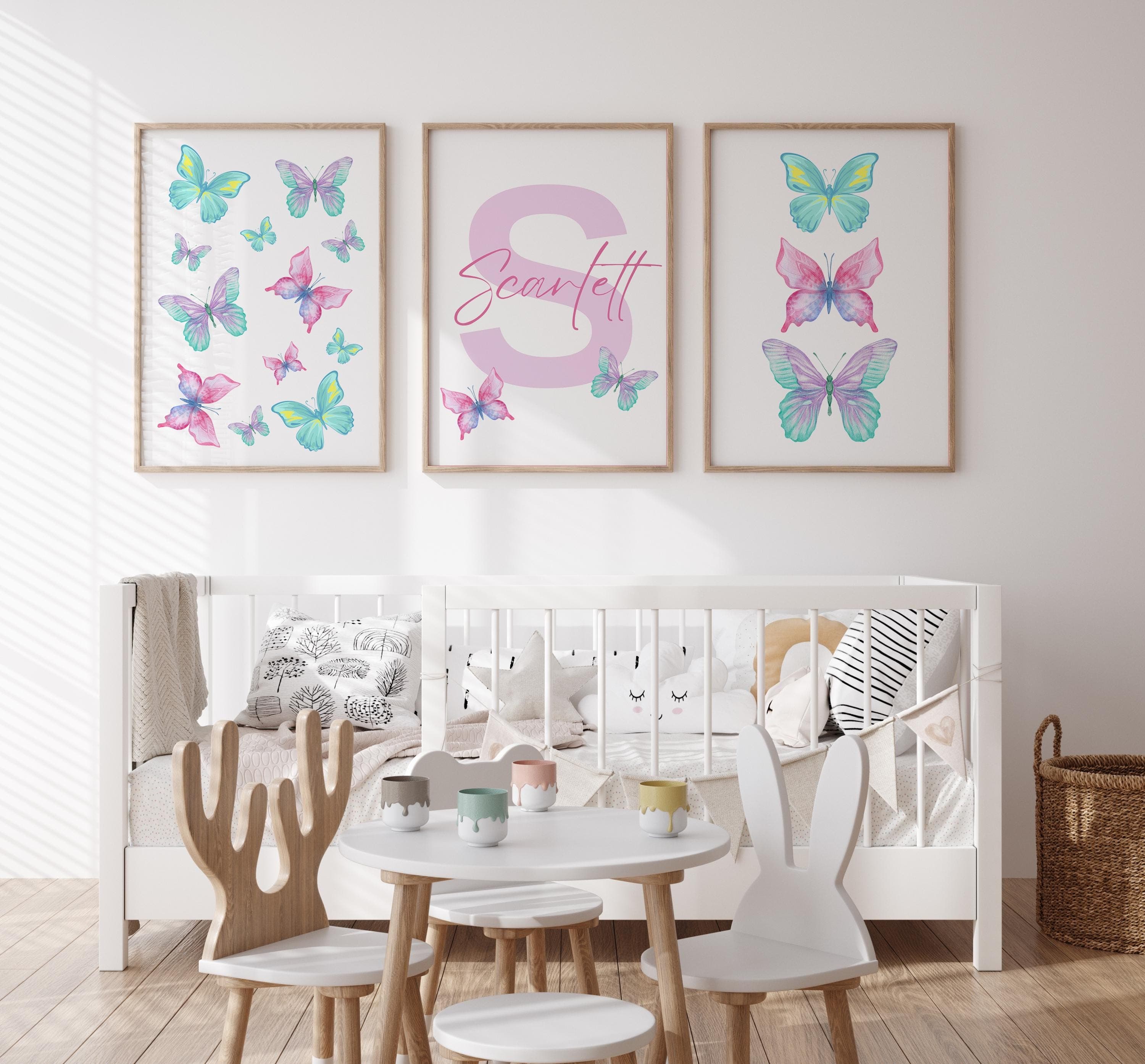 Create a magical atmosphere in your child's room with this easy-to-print pastel butterfly wall art.