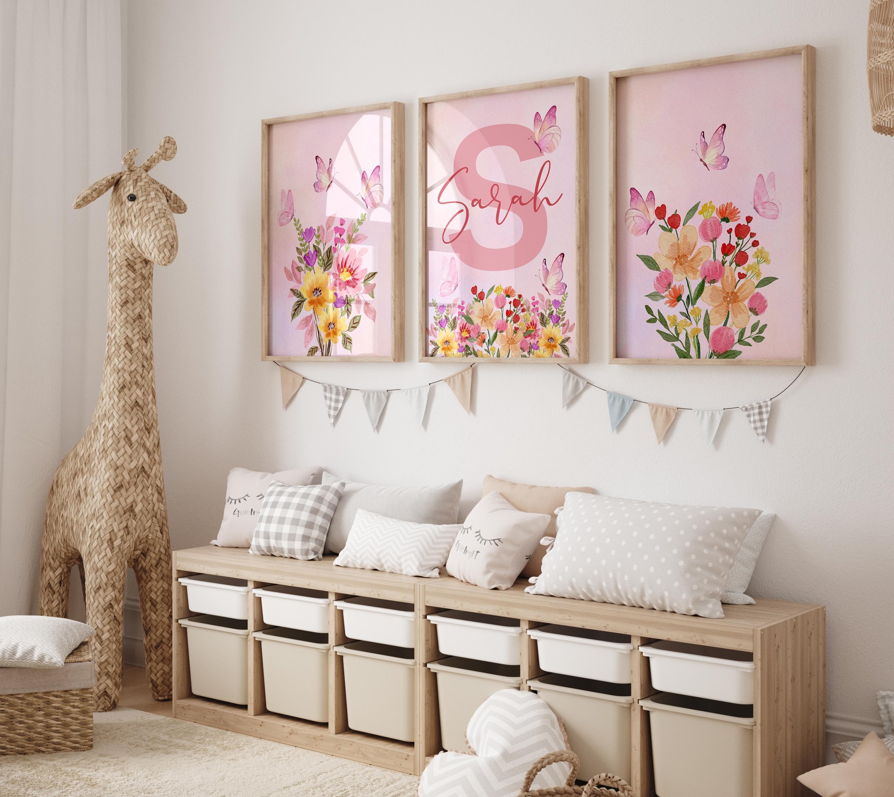 Pink watercolor flowers and butterflies wall art for girls' nursery.