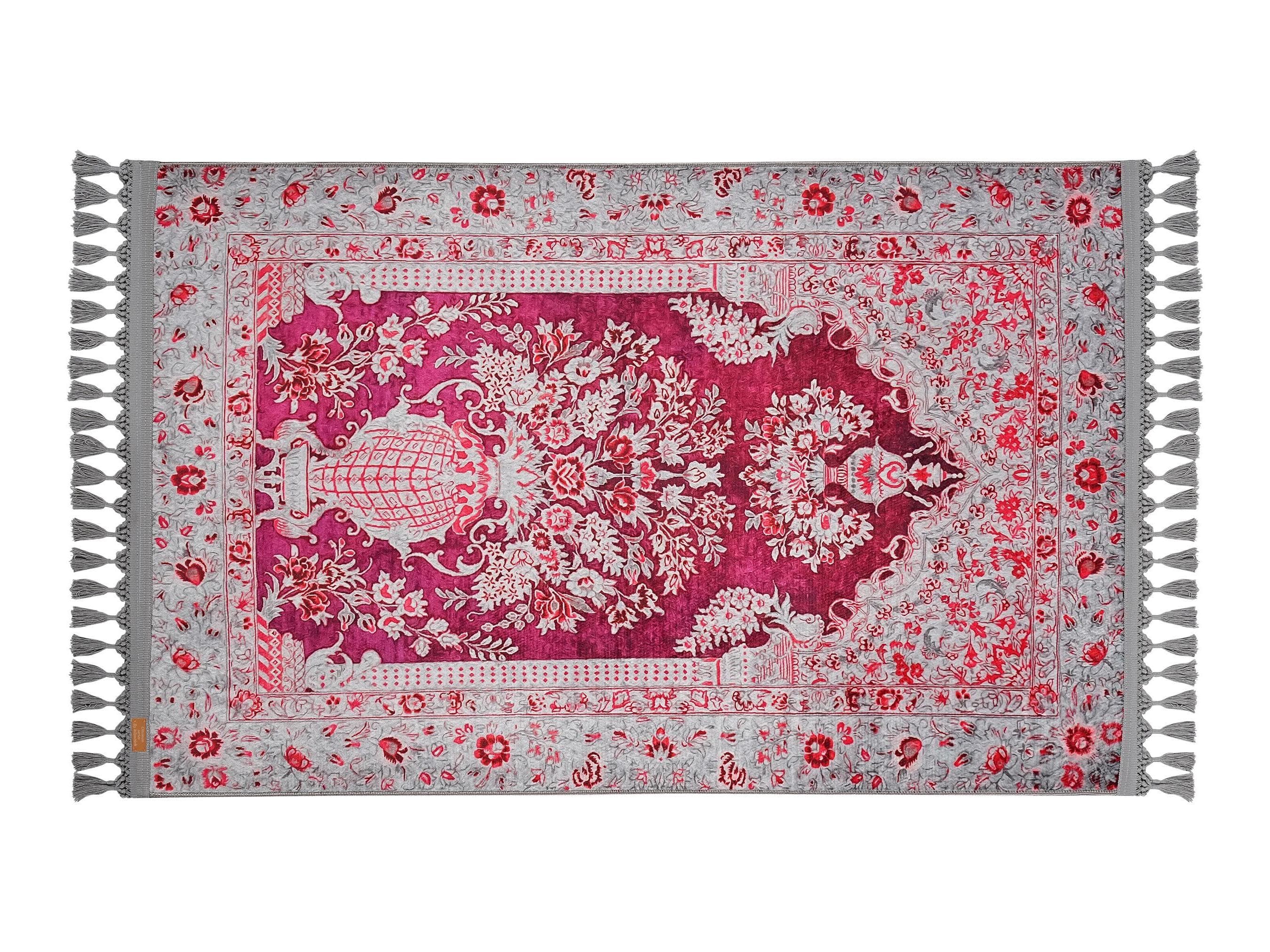 Turkish prayer rug with a fuchsia floral mihrab design, made of soft cotton woven base with non-slip backing. Measures 80x125 cm (31.5"x49.2"), 7 mm thick, and weighs 1.738 kg. Inspired by Islamic floral motifs, it showcases elegant style with hand-knotted fringes. Ideal for daily prayers at home, travel, or mosque. A meaningful gift for weddings, Ramadan, Eid, or Hajj. Optional name personalization and custom sizing available.