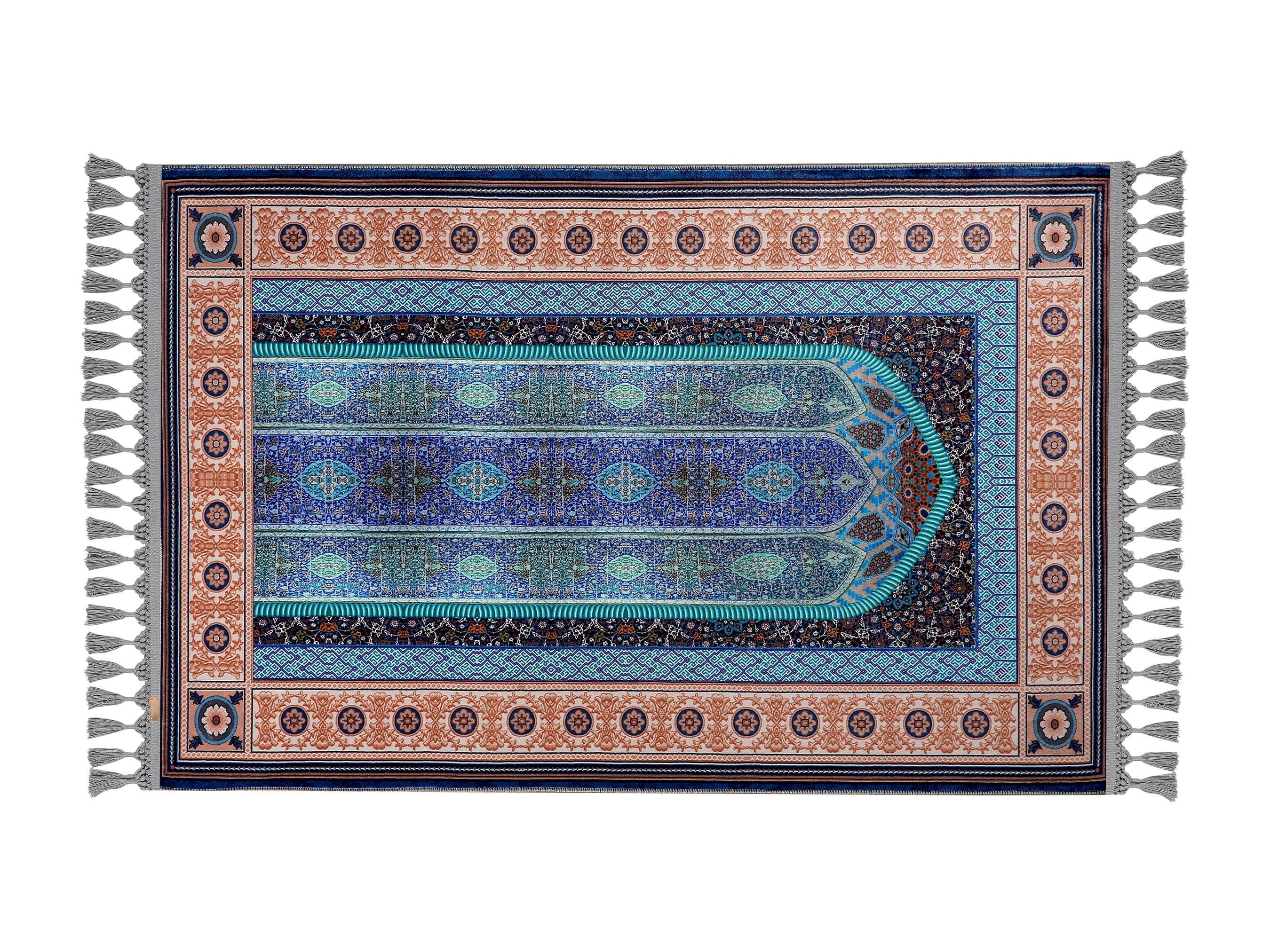Turkish prayer rug with a blue Ottoman mihrab design, made of soft cotton woven base with non-slip backing. Measures 80x125 cm (31.5"x49.2"), 7 mm thick, and weighs 1.738 kg. Inspired by classical Ottoman architecture, it showcases elegant Islamic style with hand-knotted fringes. Ideal for daily prayers at home, travel, or mosque. A meaningful gift for weddings, Ramadan, Eid, or Hajj. Optional name personalization and custom sizing available.