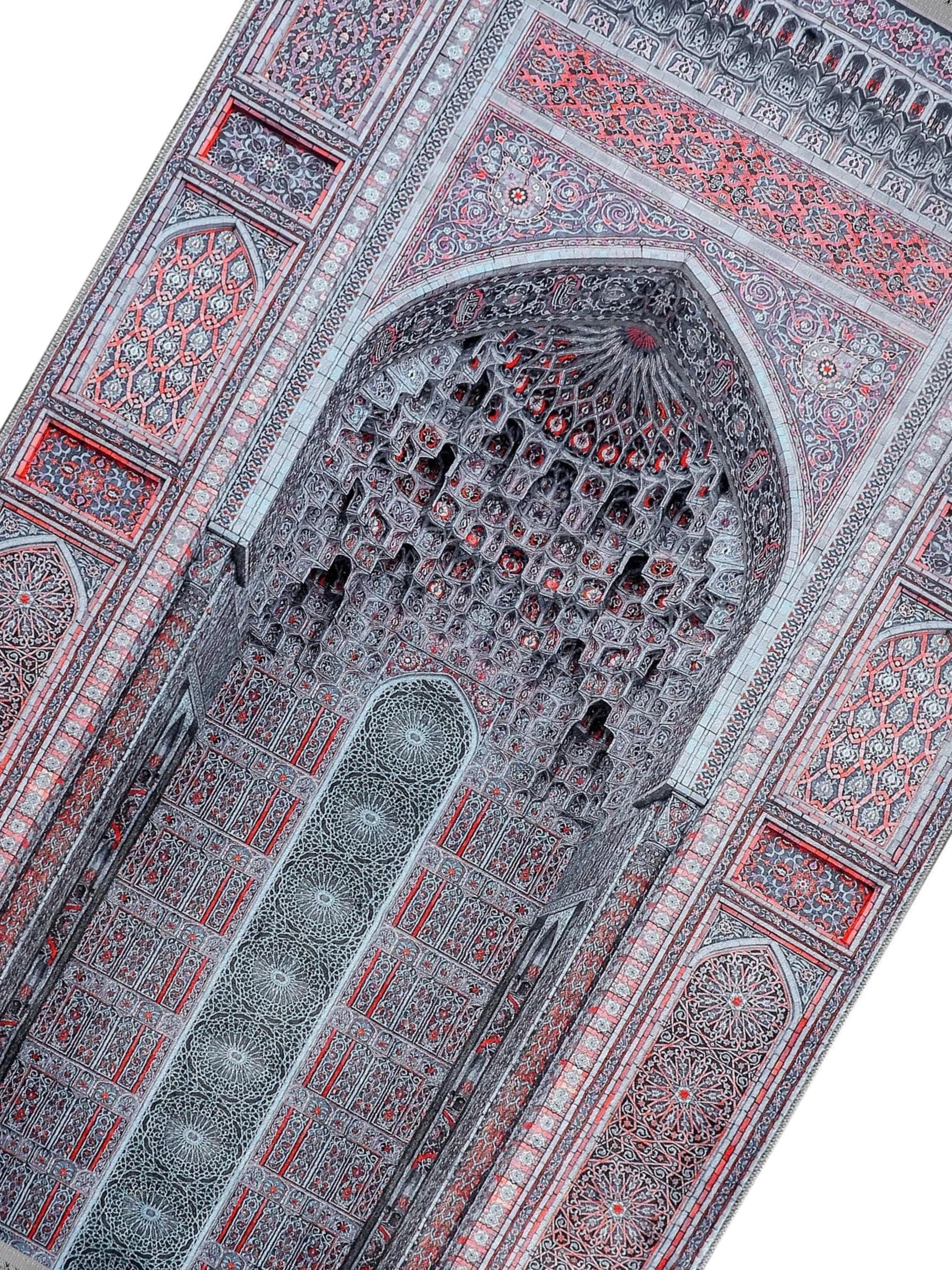 Turkish prayer rug with a grey and cinnamon Ottoman mihrab design, made of soft cotton woven base with non-slip backing. Measures 80x125 cm (31.5"x49.2"), 7 mm thick, and weighs 1.738 kg. Inspired by traditional Ottoman patterns, it reflects elegant Islamic style with hand-knotted fringes. Ideal for daily prayers at home, travel, or mosque. A meaningful gift for weddings, Ramadan, Eid, or Hajj. Optional name printing and custom sizing available.