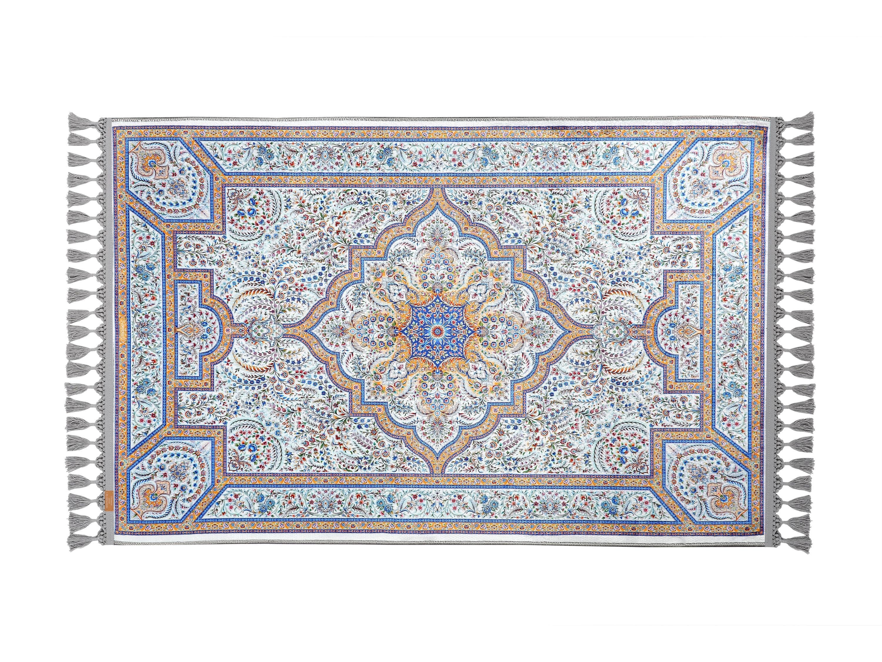 Turkish prayer rug with a blue geometric design, made of soft cotton woven base with non-slip backing. Measures 80x125 cm (31.5"x49.2"), 7 mm thick, and weighs 1.738 kg. Inspired by Islamic geometric art, it showcases elegant style with hand-knotted fringes. Ideal for daily prayers at home, travel, or mosque. A meaningful gift for weddings, Ramadan, Eid, or Hajj. Optional name personalization and custom sizing available.