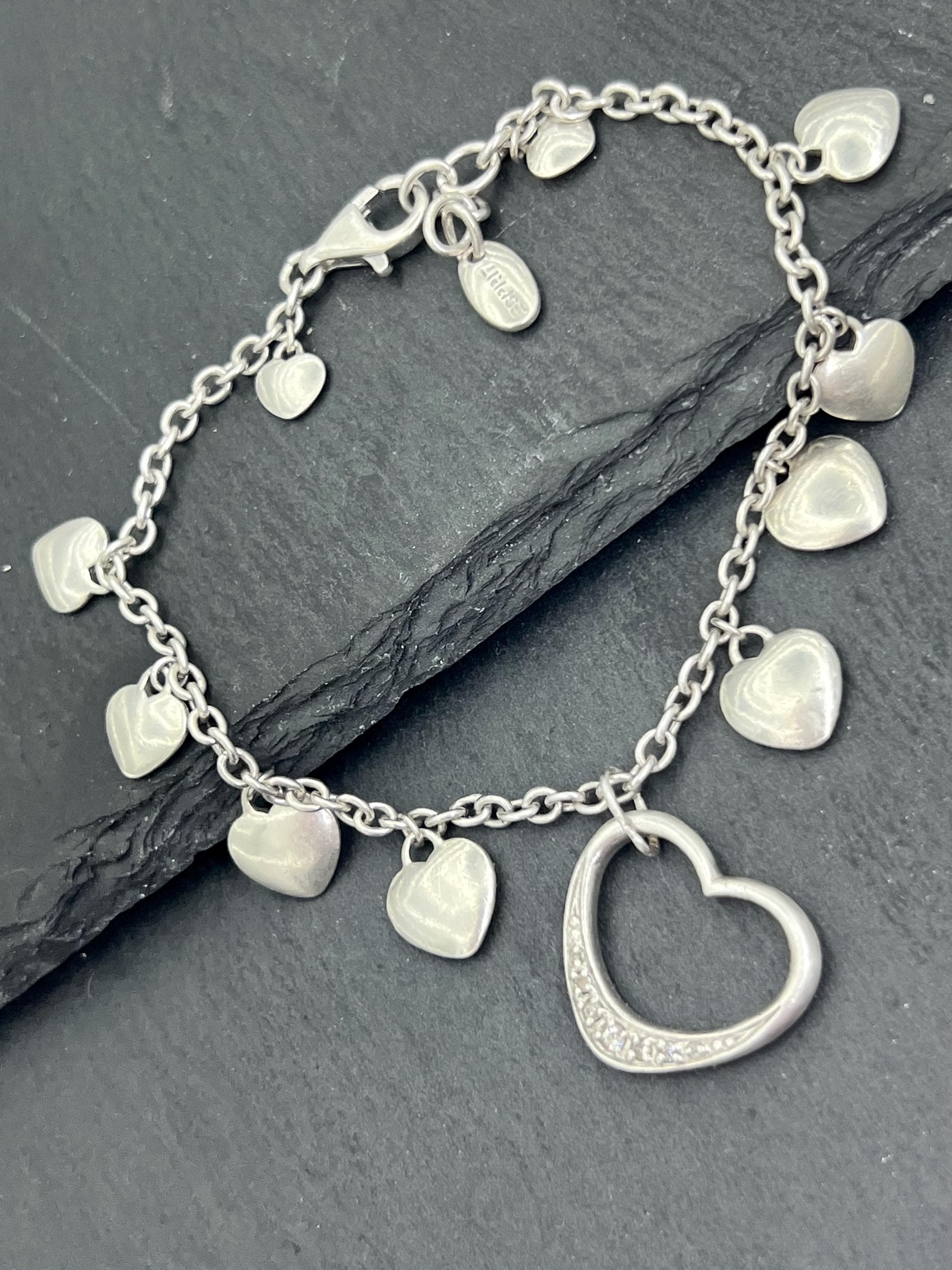 vintage ESPRIT bracelet with solid and openwork heart charms in 925 sterling silver, lobster clasp and oval tag stamped ESPRIT