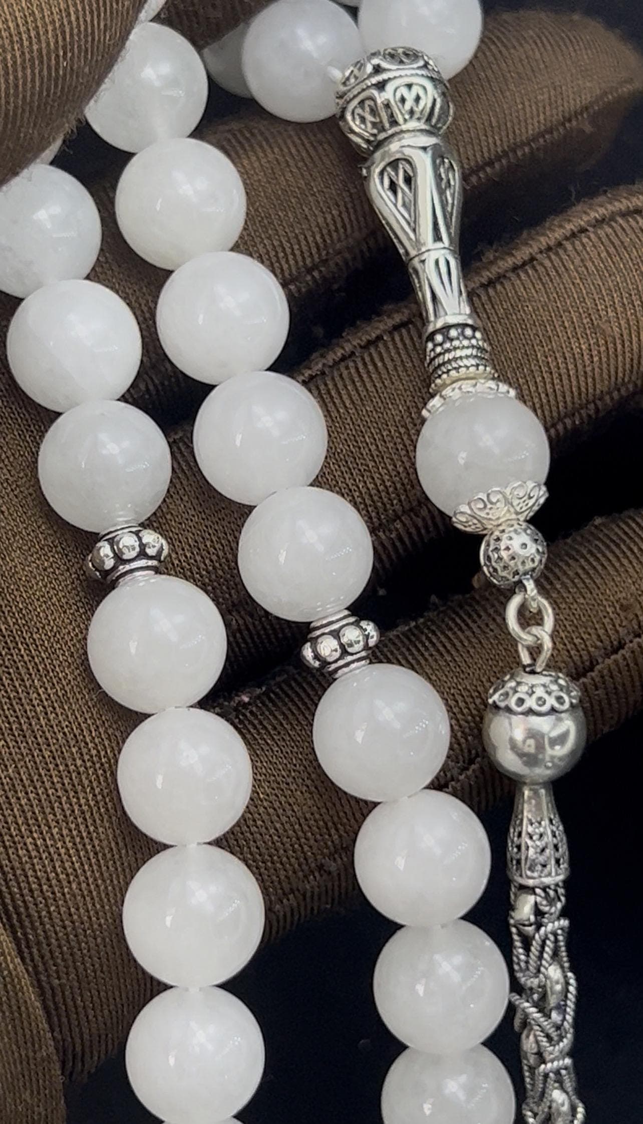 White Jade Tasbih, 925 Sterling Silver Tassel. Elegant prayer beads made of natural stone, perfect for meditation, energy balance, or as a thoughtful Islamic gift. Featuring artisan filigree crafted silver details
