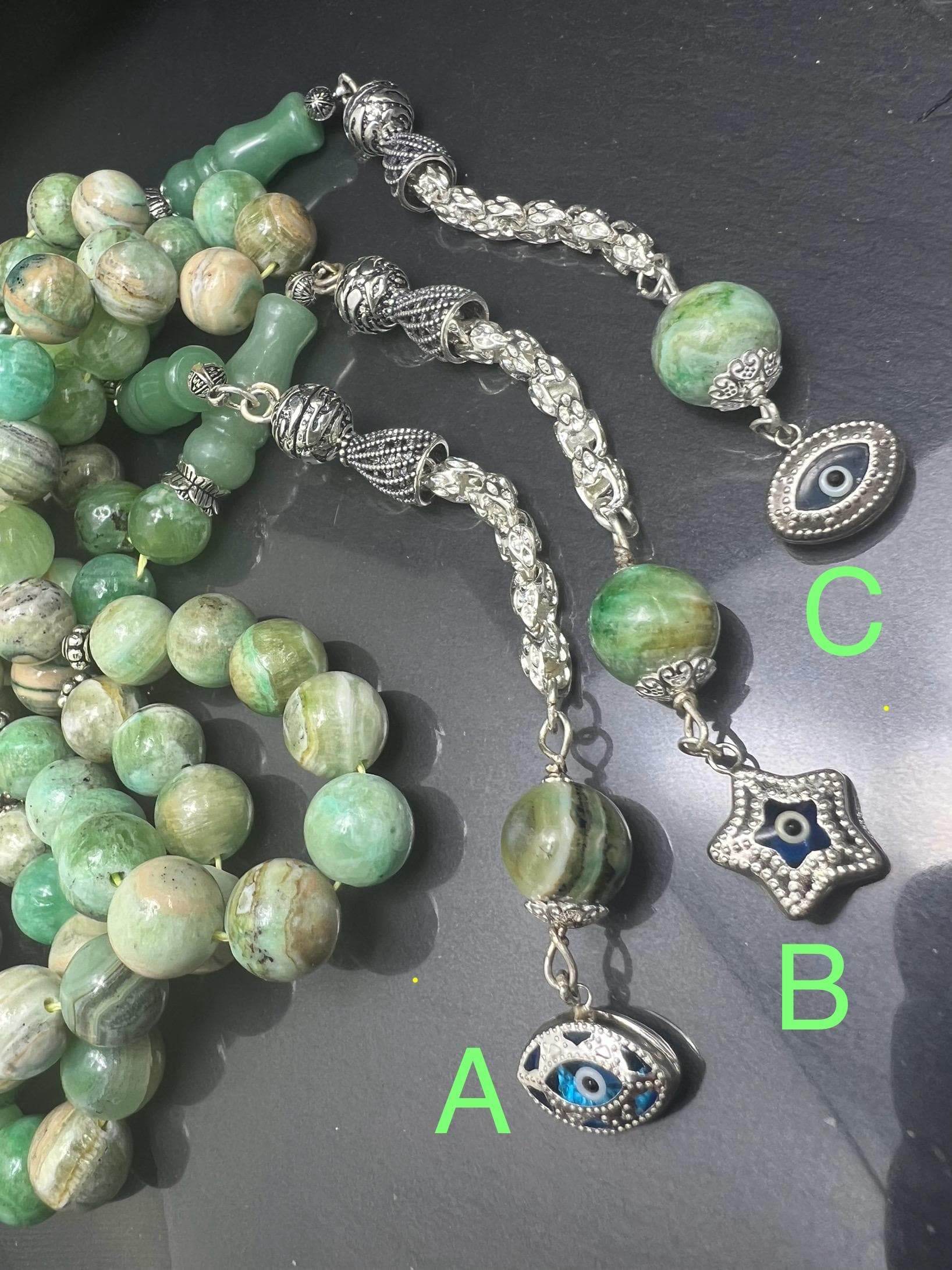 Natural Phoenix Jade Tasbih with 33 beads, handmade with 925 sterling silver tassel. Ideal for Ramadan, Eid al-Adha, AkueShop, spiritual healing, heart chakra energy.