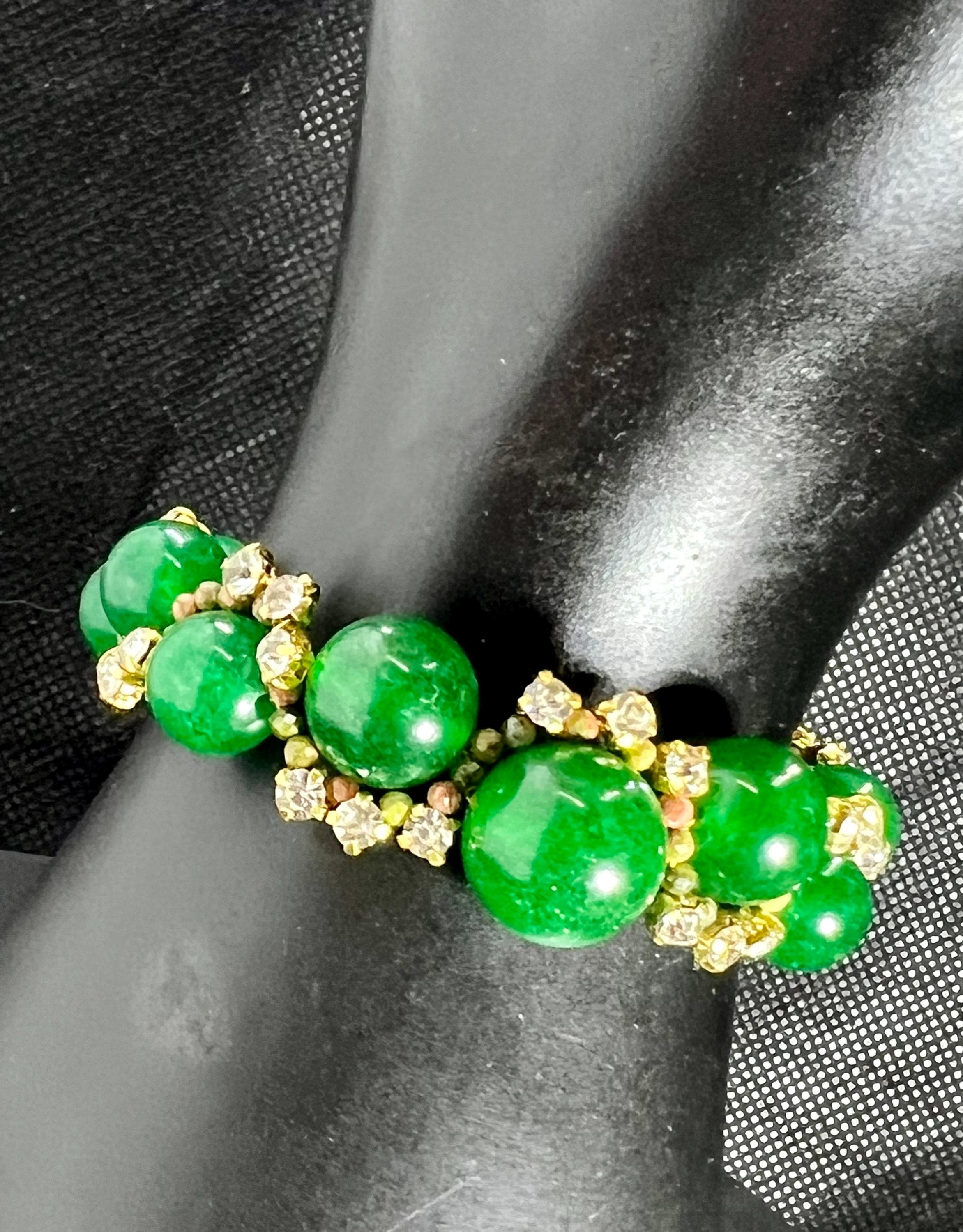 Natural Jade Bracelet, Gold Plated Clasp, Positive Energy, Bling Bling style, on a black mannequin