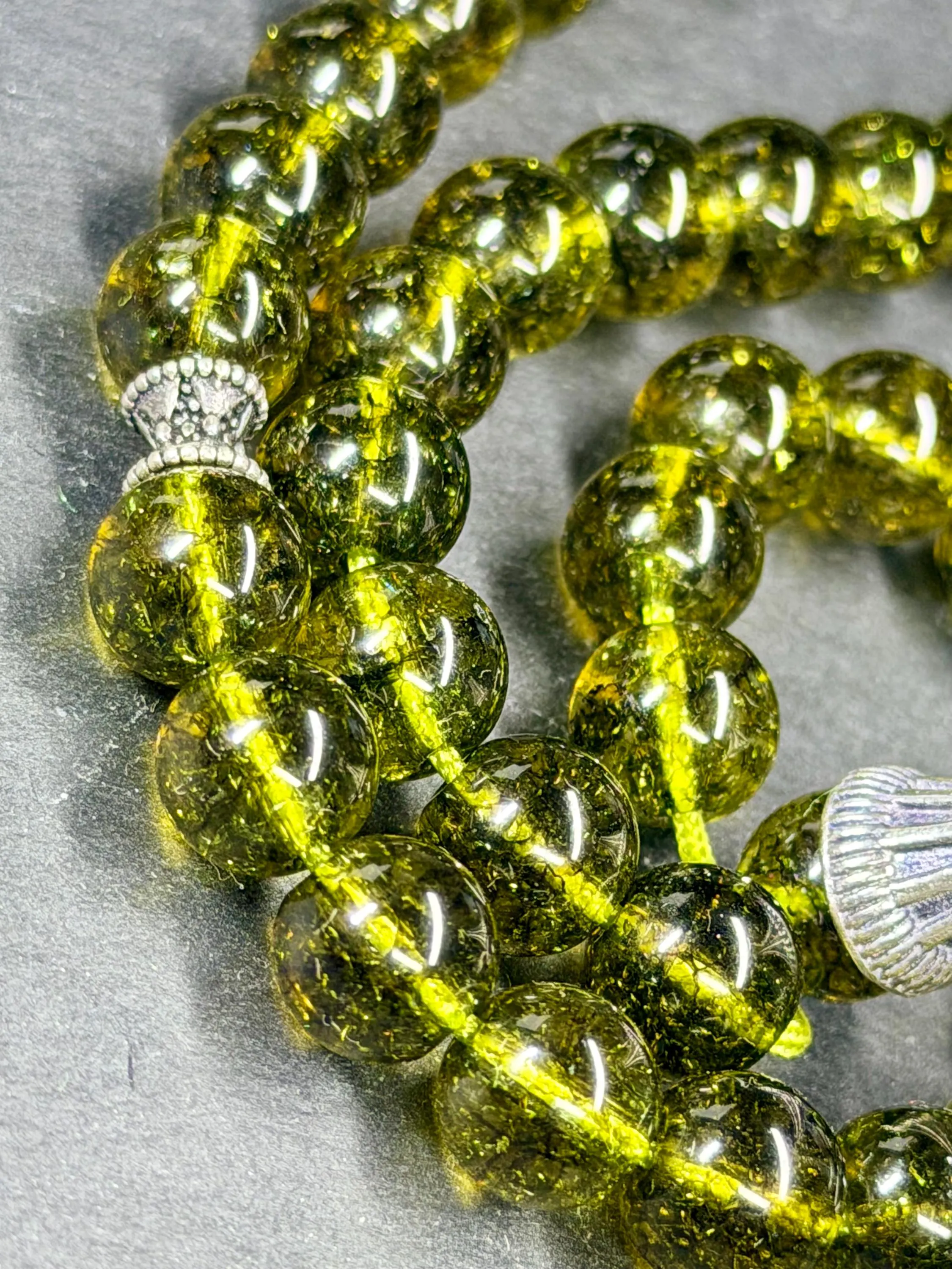 close up on the green peridot beads