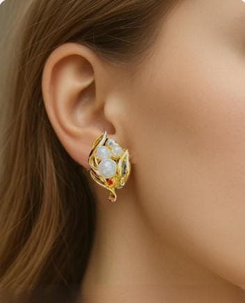 Vintage gold-tone clip-on earrings with floral design and imitation pearls, ai model image.