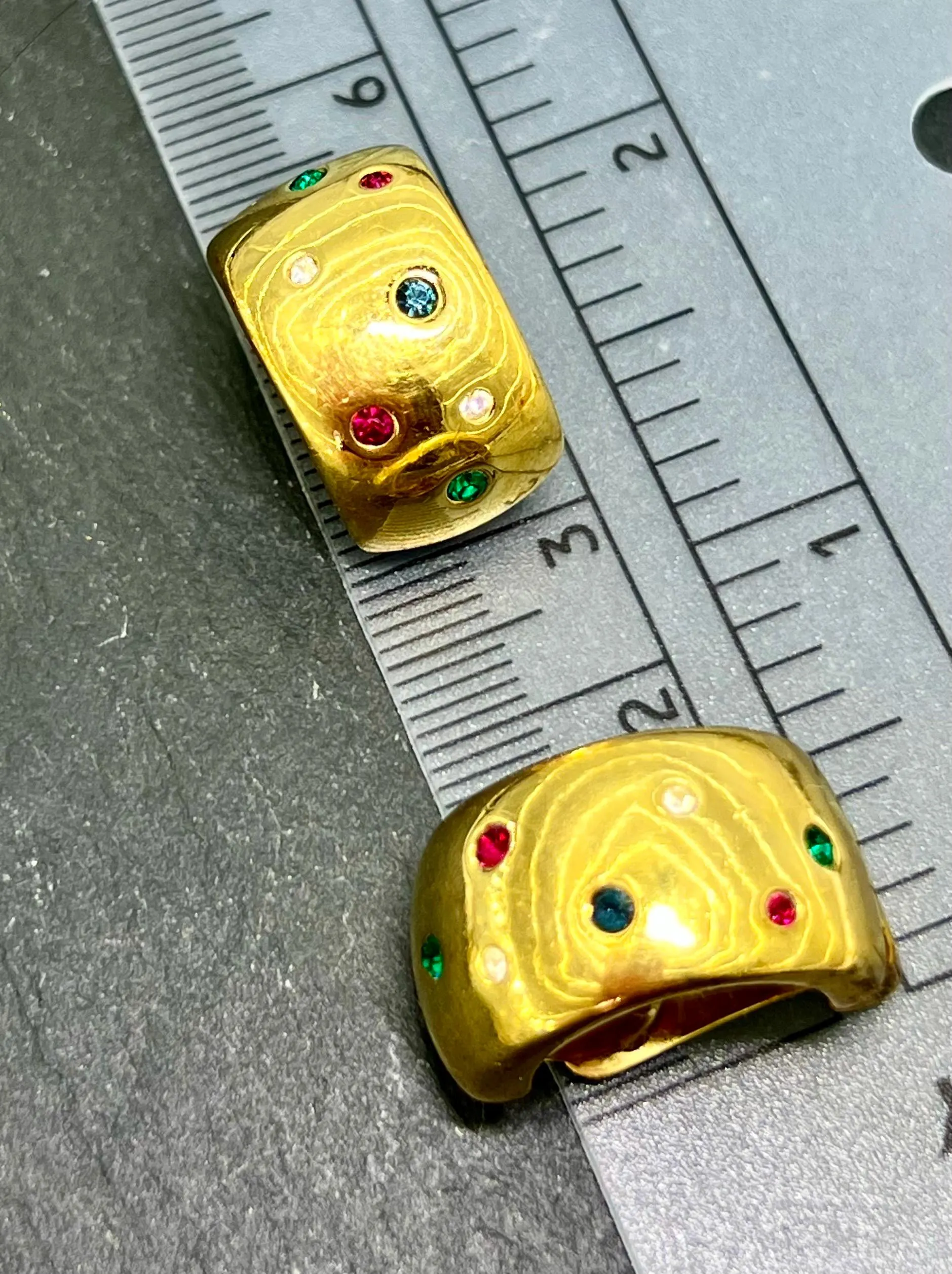Signed Grossé clip-on earrings from the 1980s — gold-filled with 7 multicolour crystals. A rare luxury vintage piece in great condition. photo on a ruler