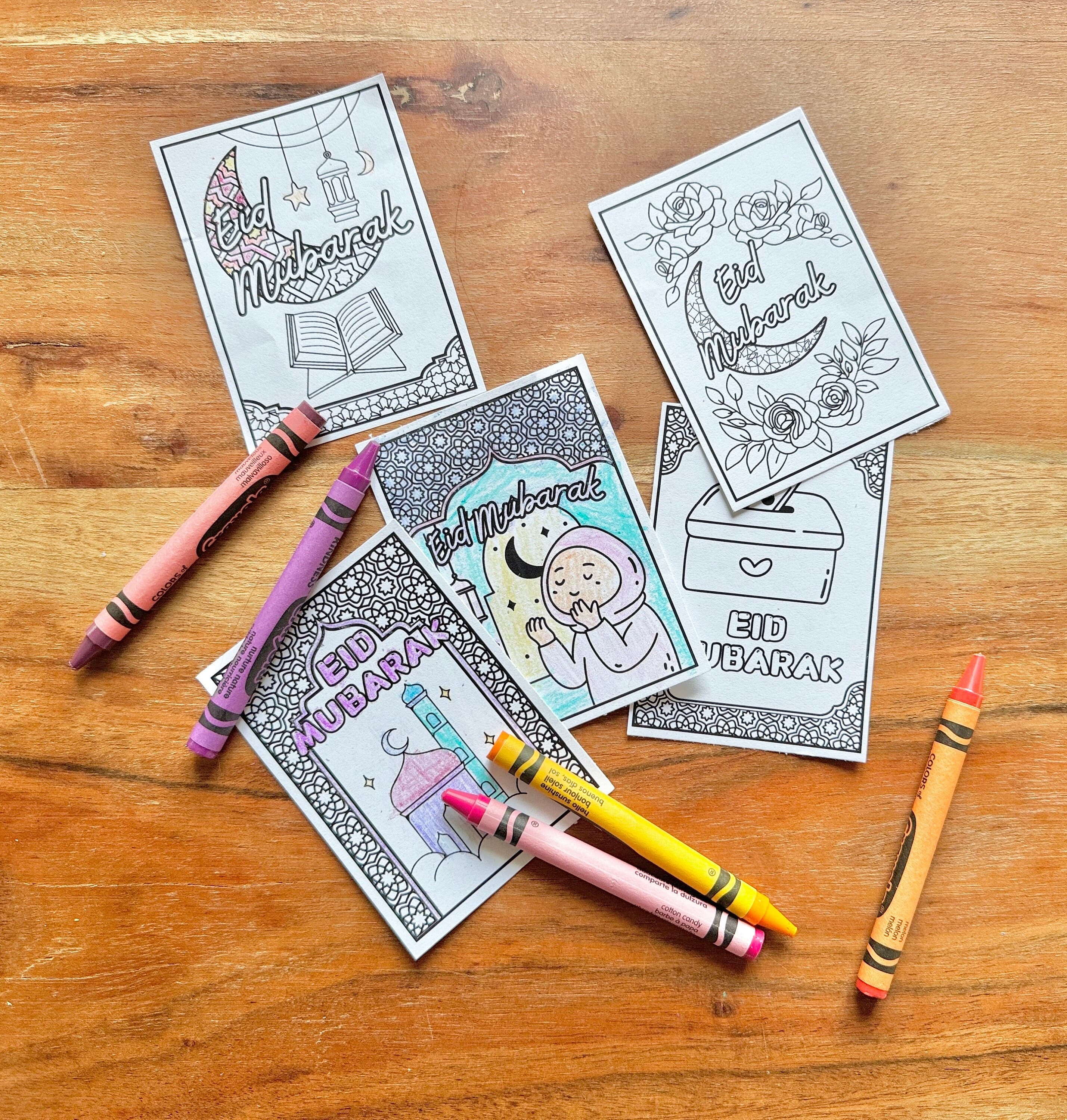 Black and white Eid coloring cards for kids, featuring Eid Mubarak designs. Islamic greeting cards digital download, perfect for DIY Eid card printables and fun Ramadan activities.