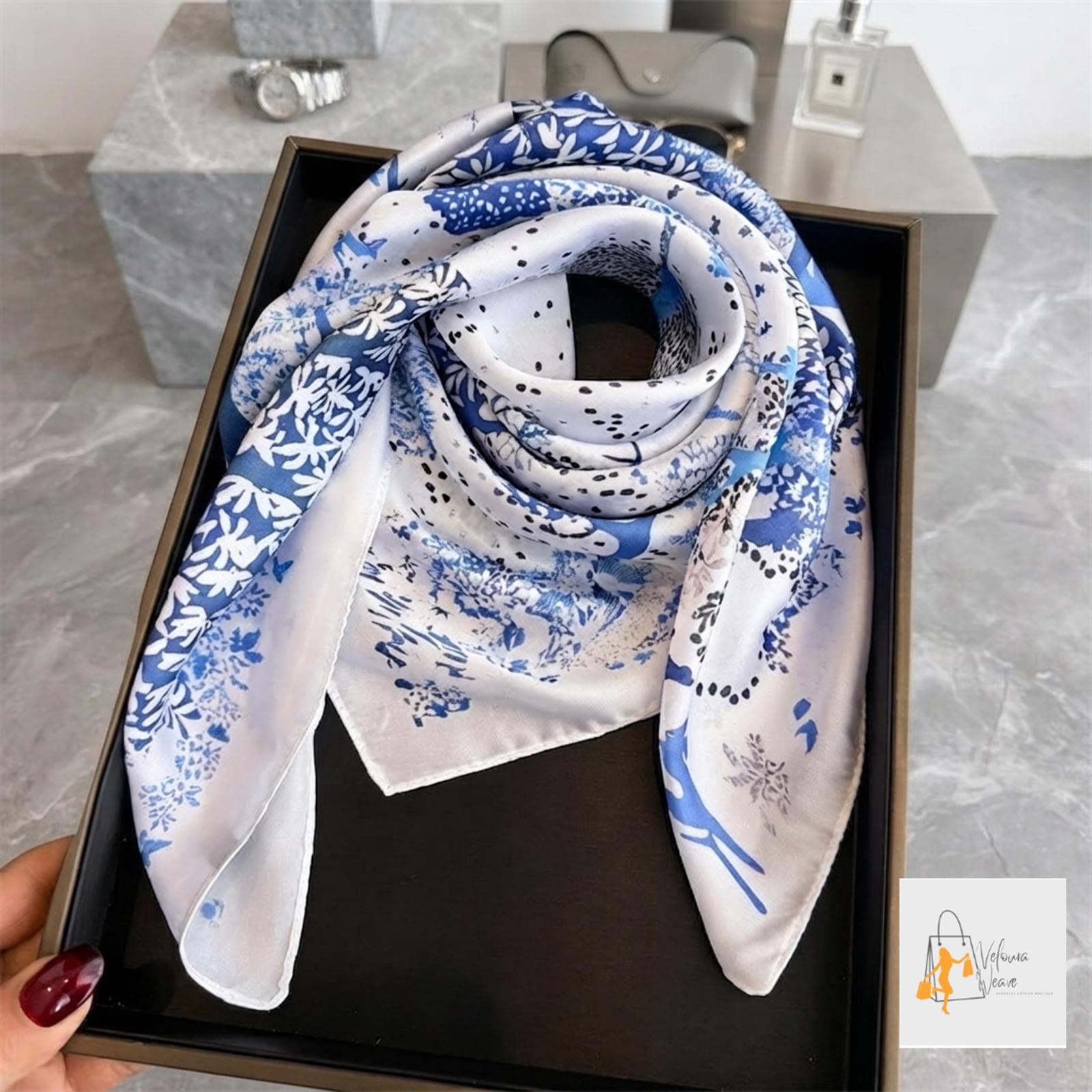 Bright floral scarf paired with a summer dress for a fresh seasonal look.