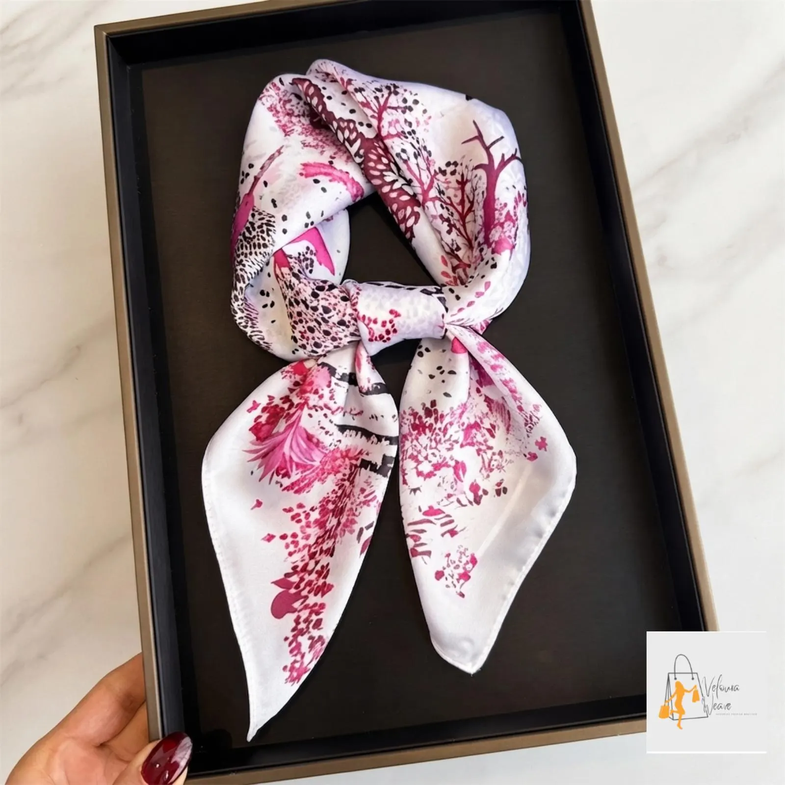 Elegant square scarf neatly packaged as a thoughtful gift for her.
